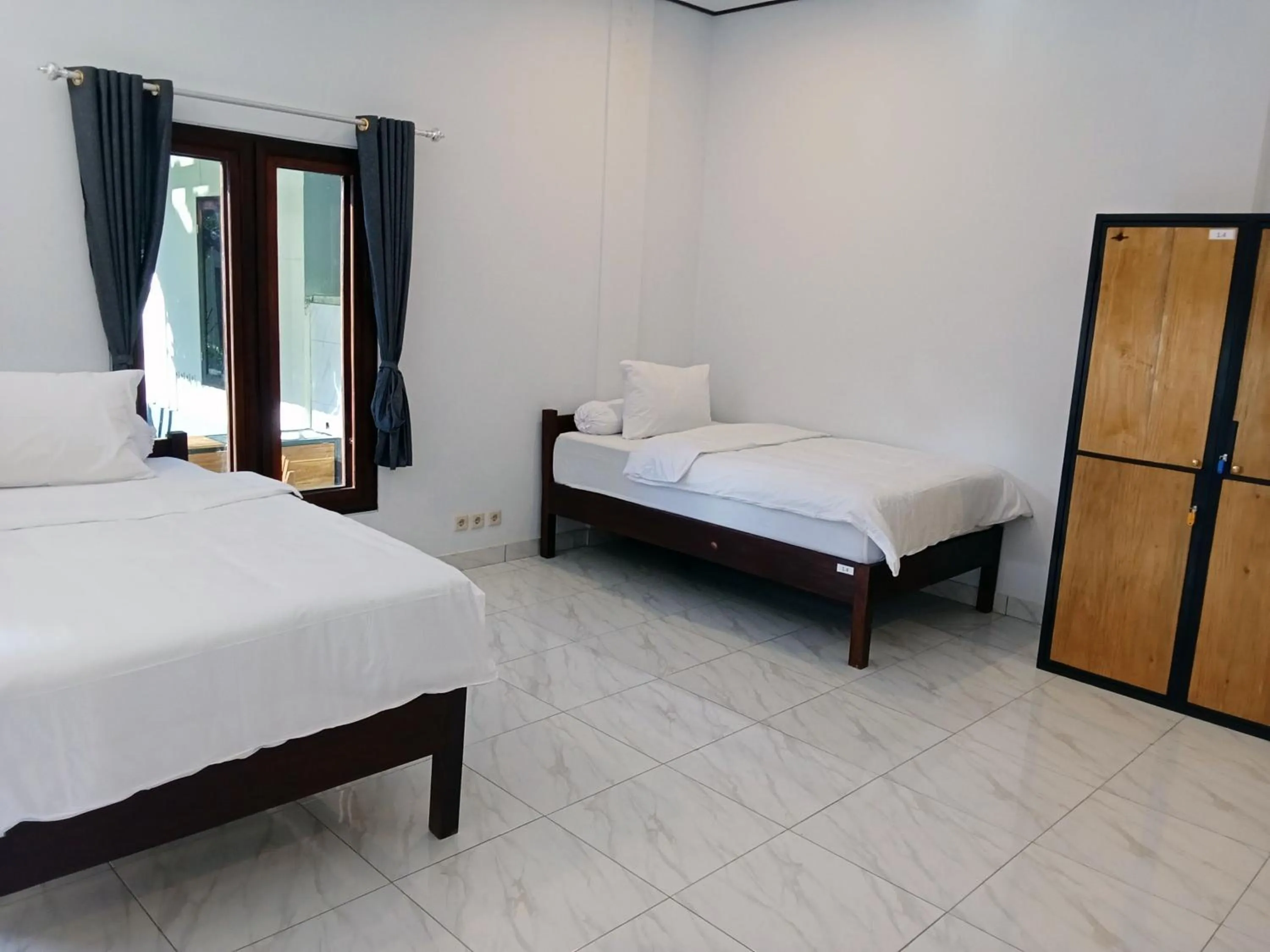 Bed in Scuba Tribe Bali dive-resort