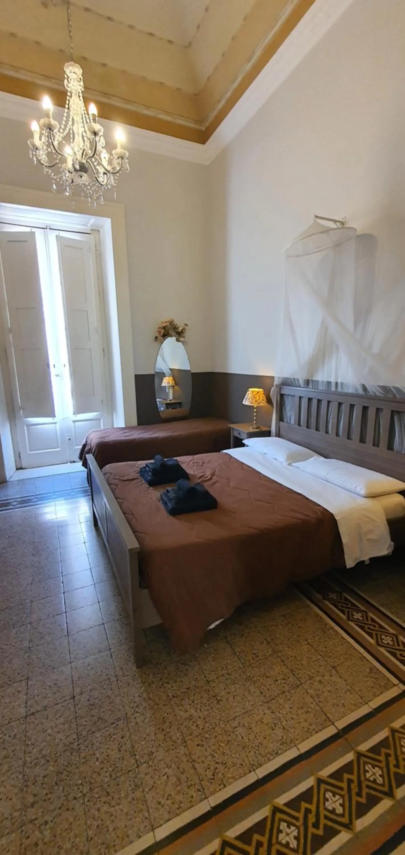 Decorative detail, Bed in Affittacamere Museo