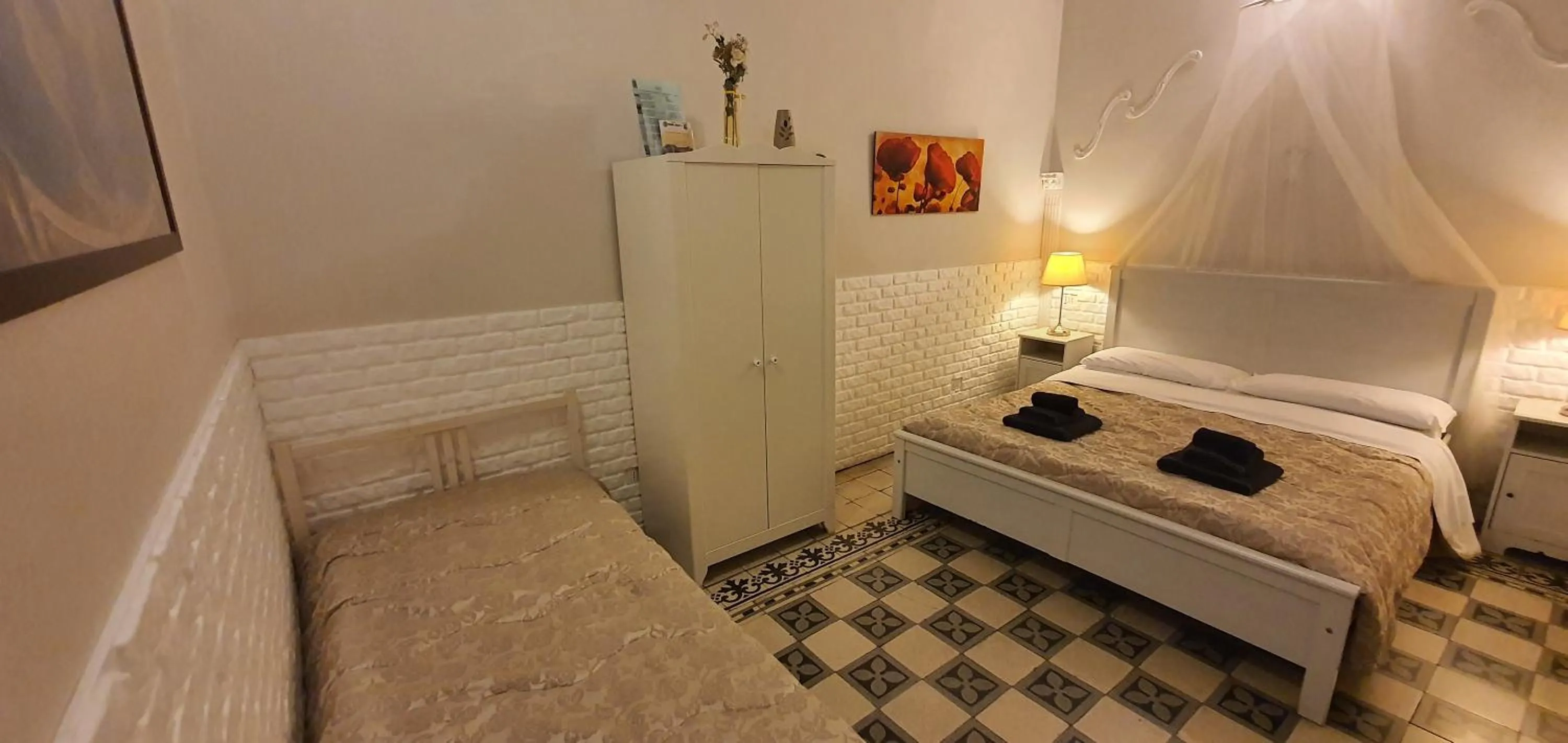 Bed in Affittacamere Museo