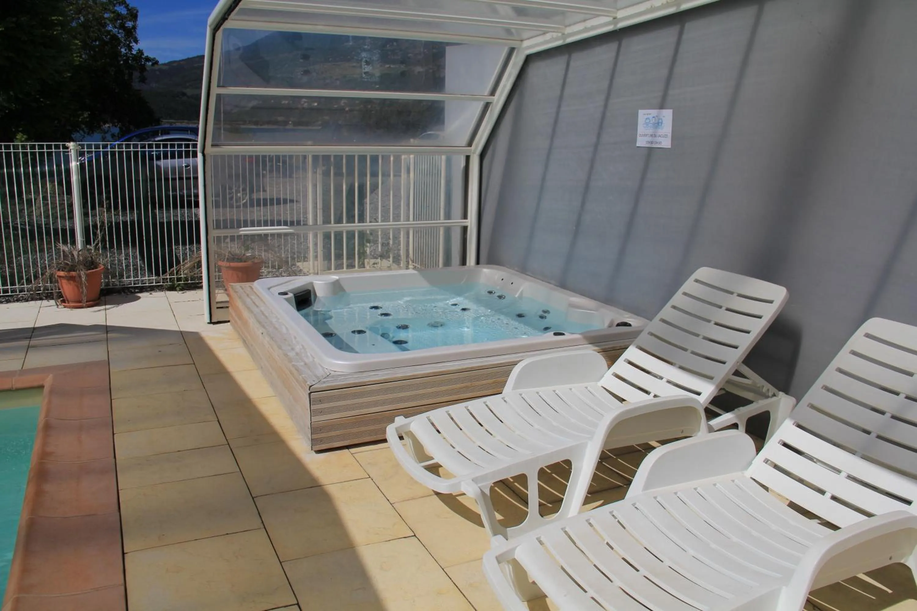 Swimming pool in Hôtel Les Flots Bleus