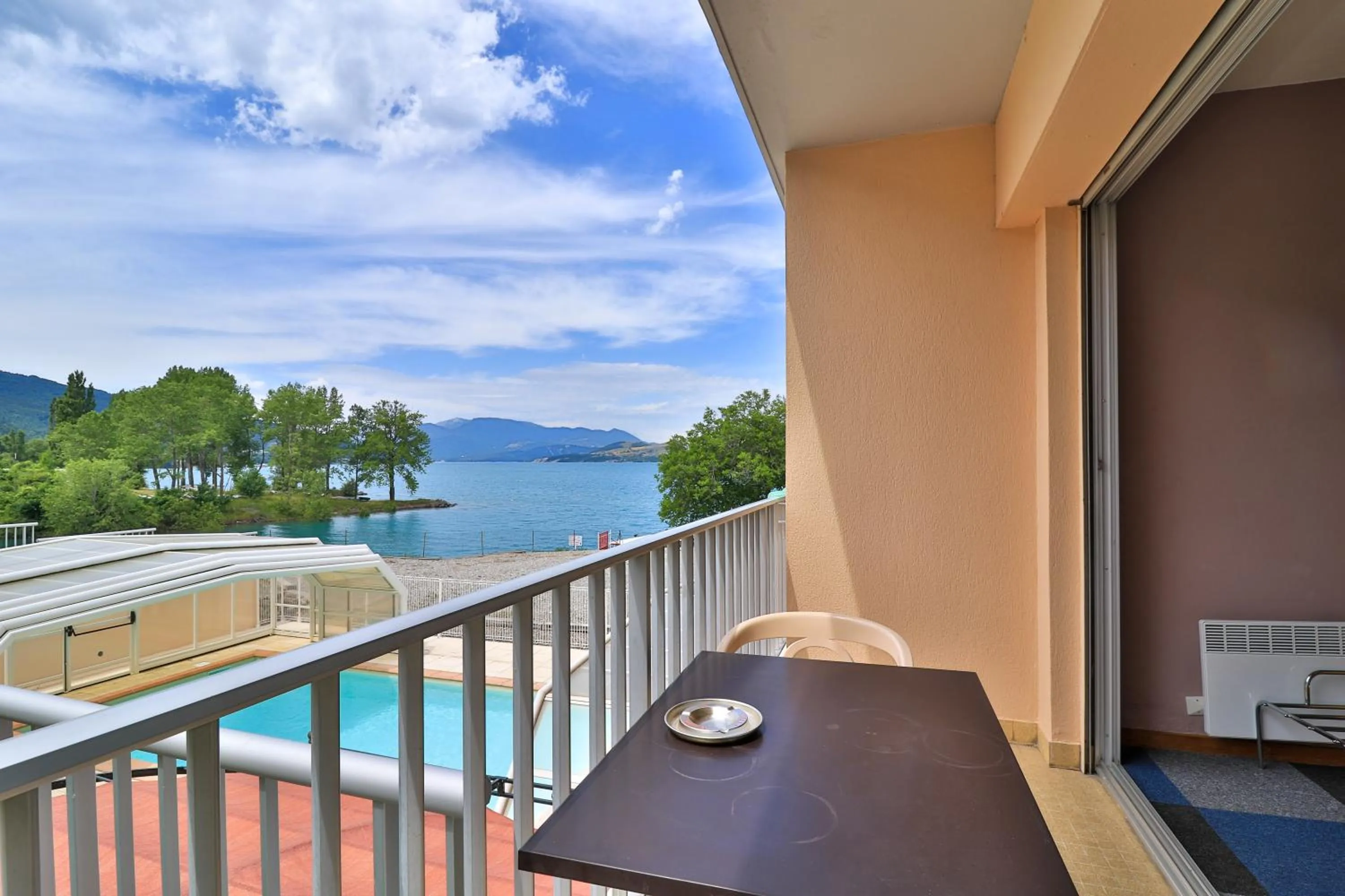 Pool view in Hôtel Les Flots Bleus