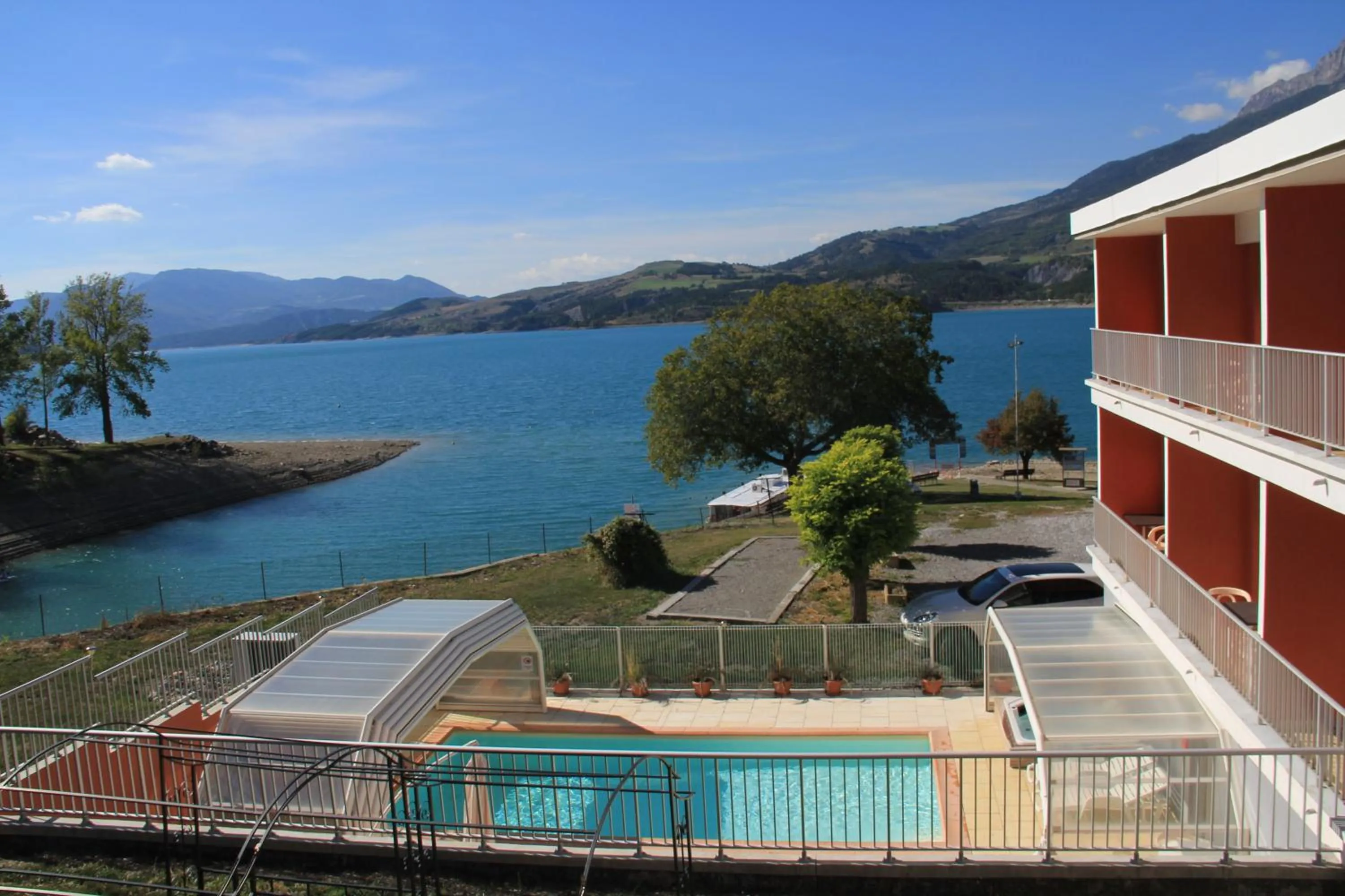 Swimming pool in Hôtel Les Flots Bleus