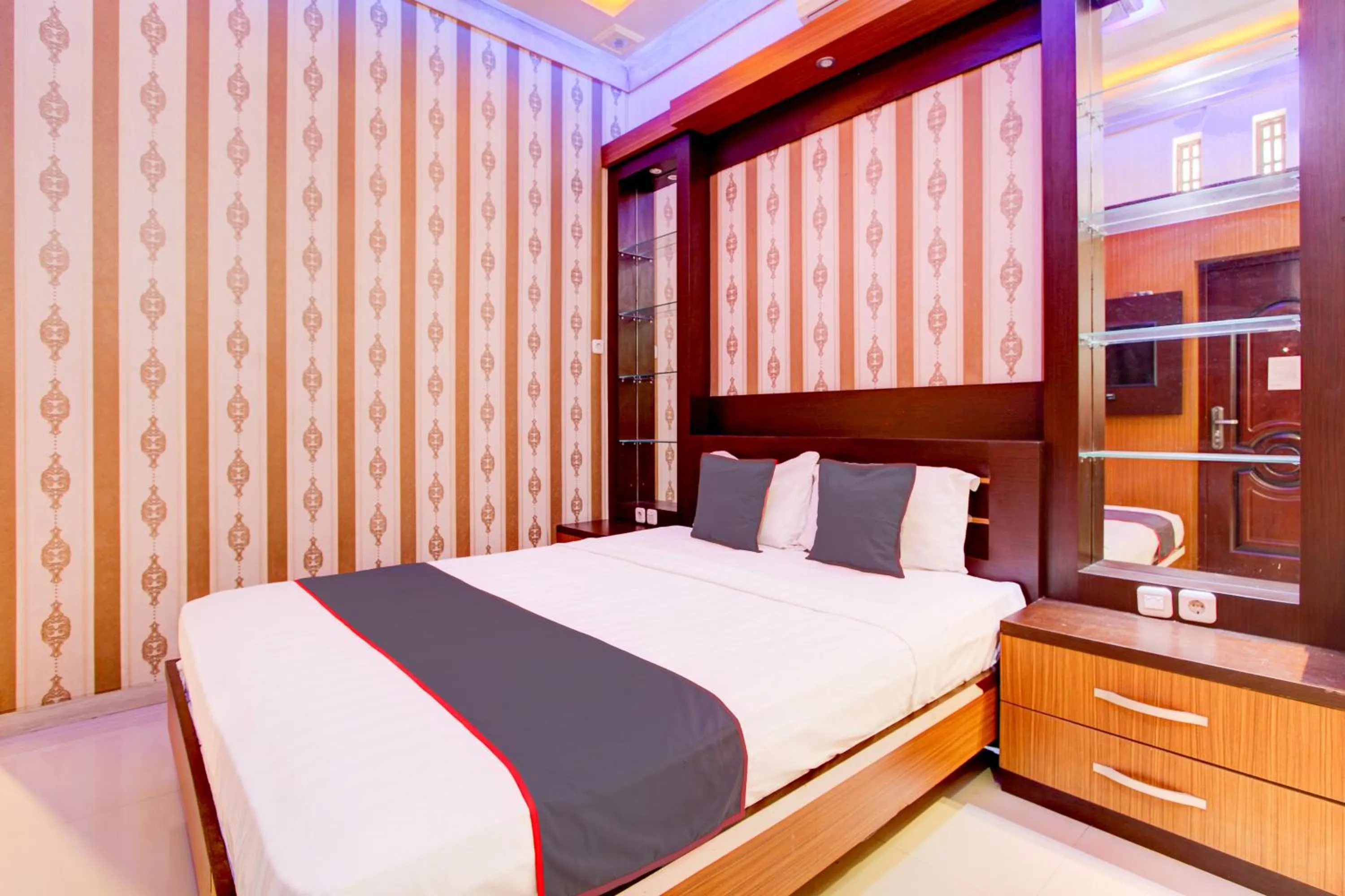 Photo of the whole room, Bed in Hotel O Yogyakarta near Jogja City Mall formerly Bama Guesthouse