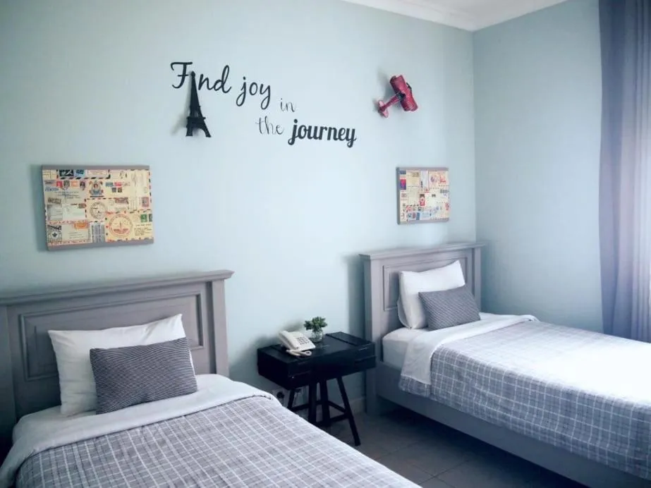 Bed in Cottonwood Bed & Breakfast House Bandung