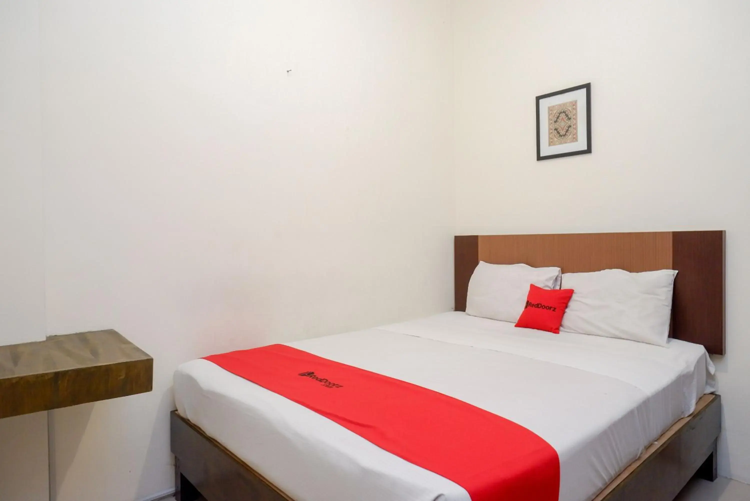 Bed in RedDoorz Syariah At Namira Hotel Bed in RedDoorz Syariah At Namira Hotel