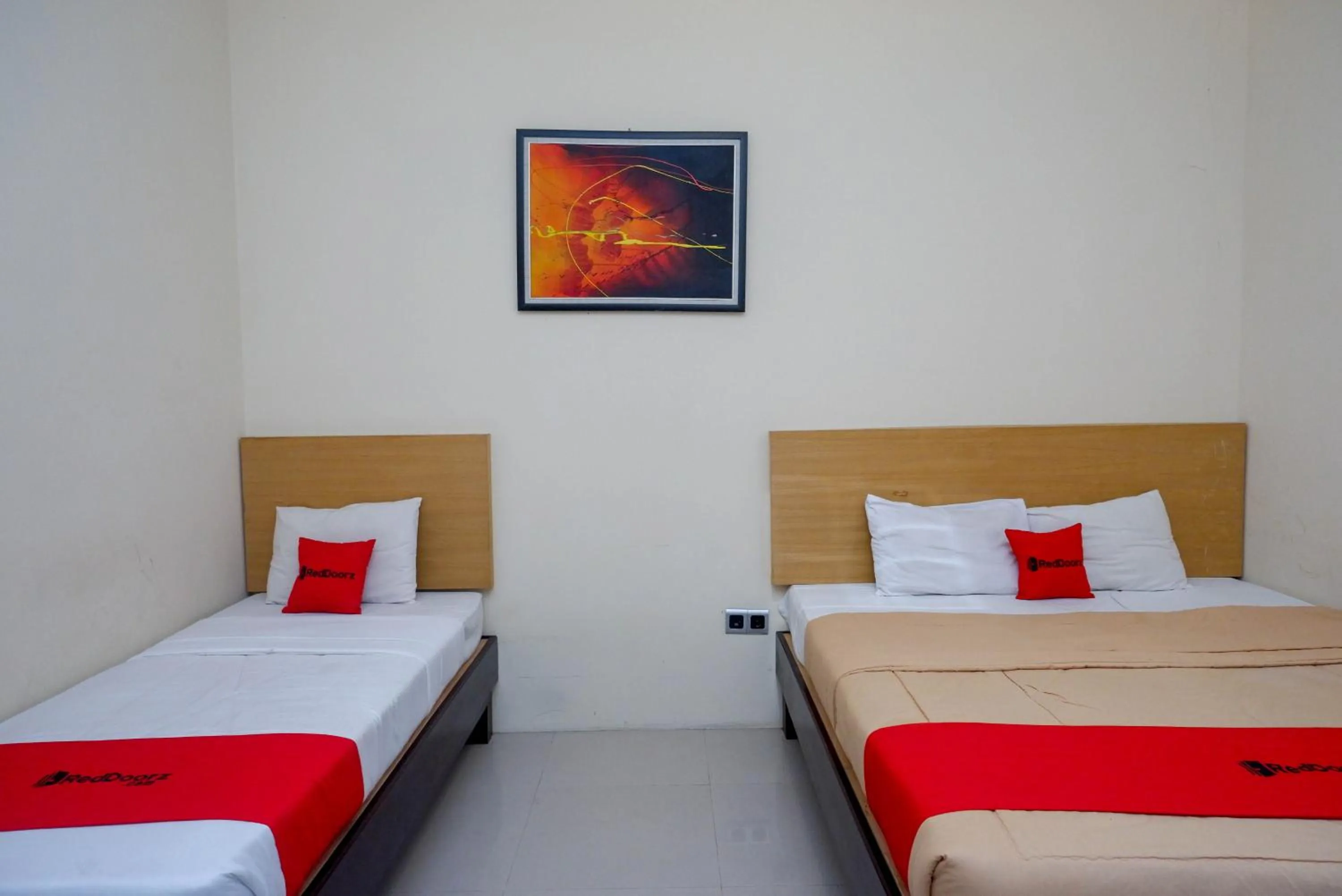 Bed in RedDoorz Syariah At Namira Hotel