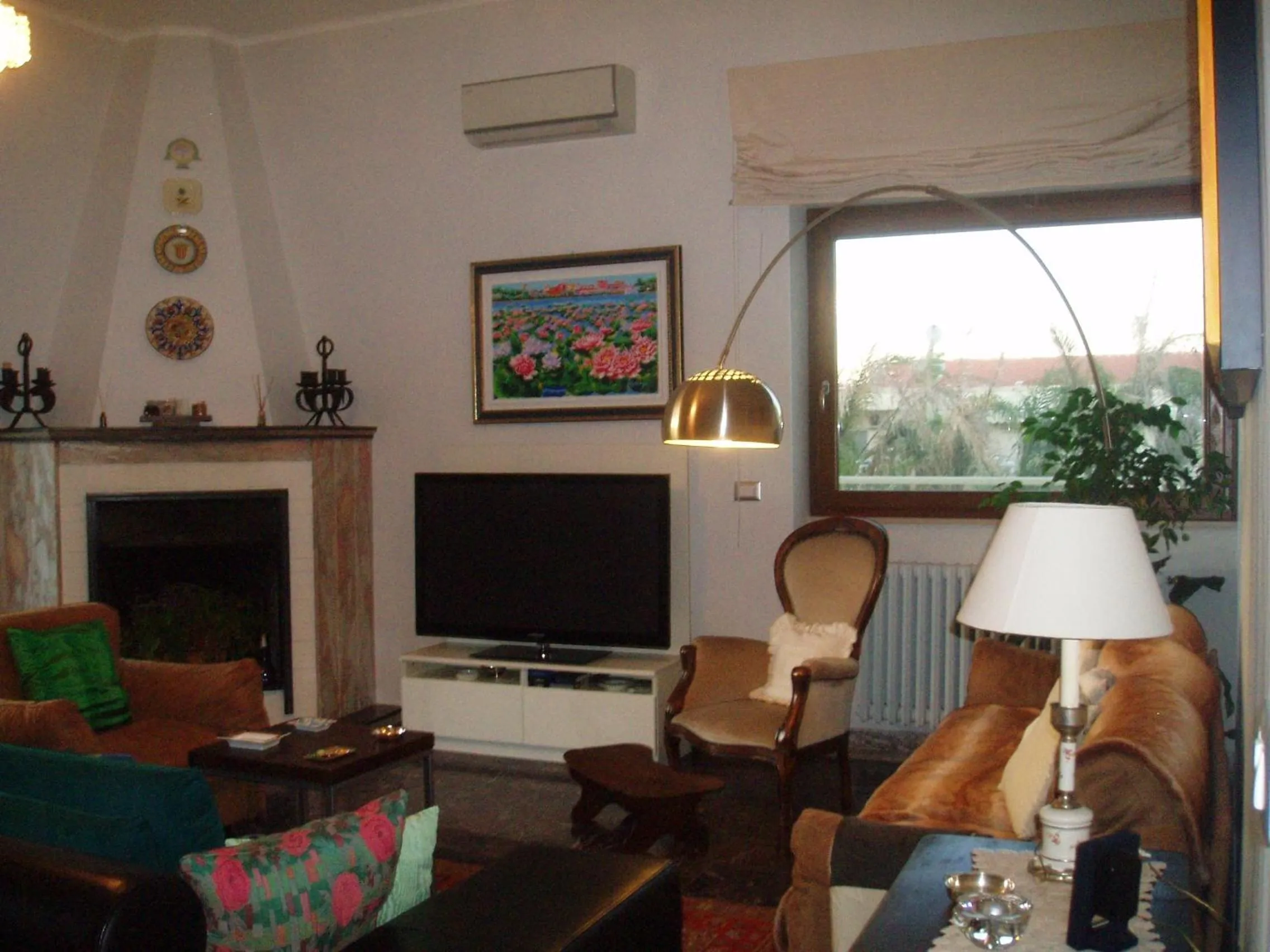 Communal lounge/ TV room in Villa Dafne