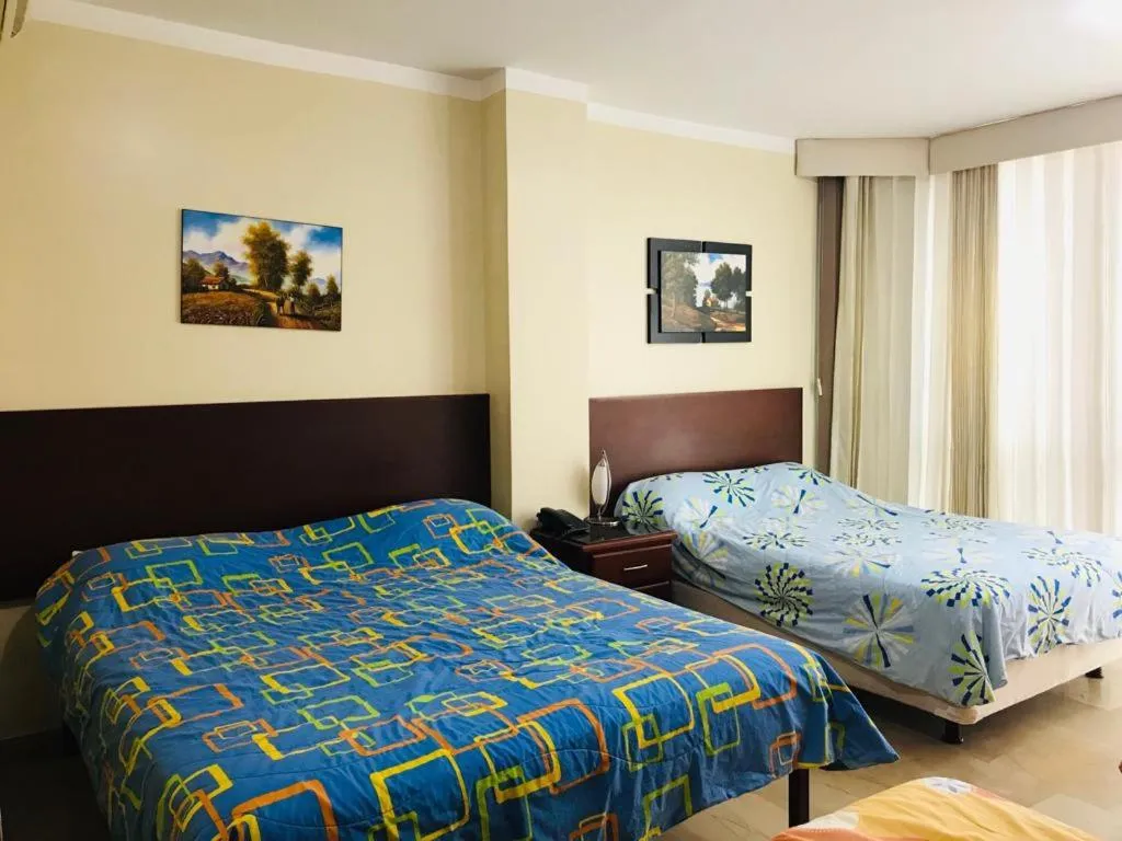 Bed in Sol Del Sur Hotel