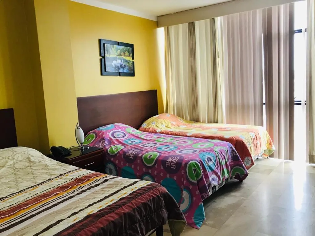 Bed in Sol Del Sur Hotel