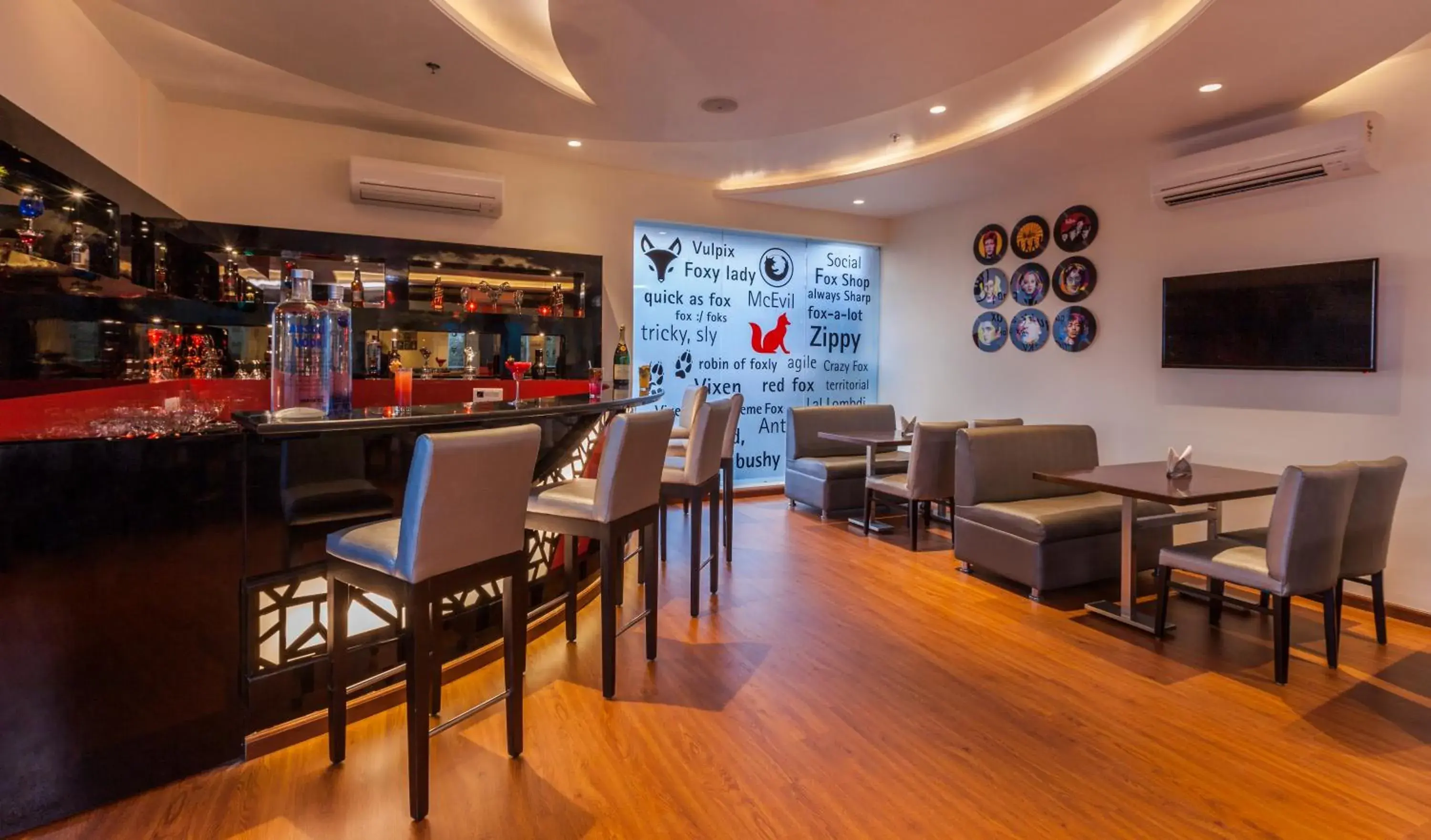 Lounge or bar in Red Fox by Lemon Tree Hotels, Alwar Lounge or bar in Red Fox by Lemon Tree Hotels, Alwar