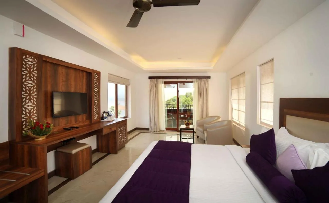 Bed in CONTOUR ISLAND RESORT & SPA , wayanad