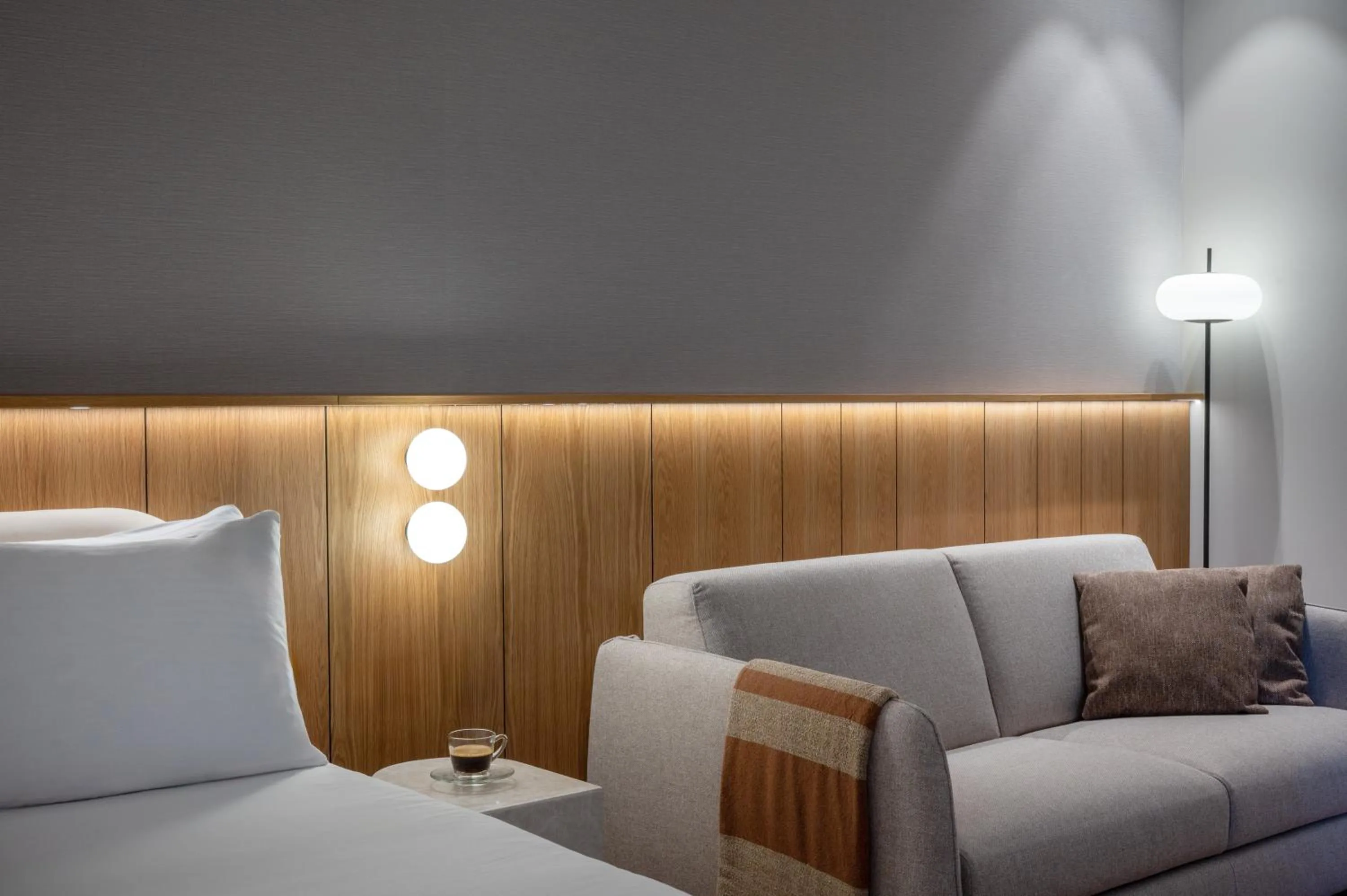 Seating area, Bed in Leonardo Hotel Negev