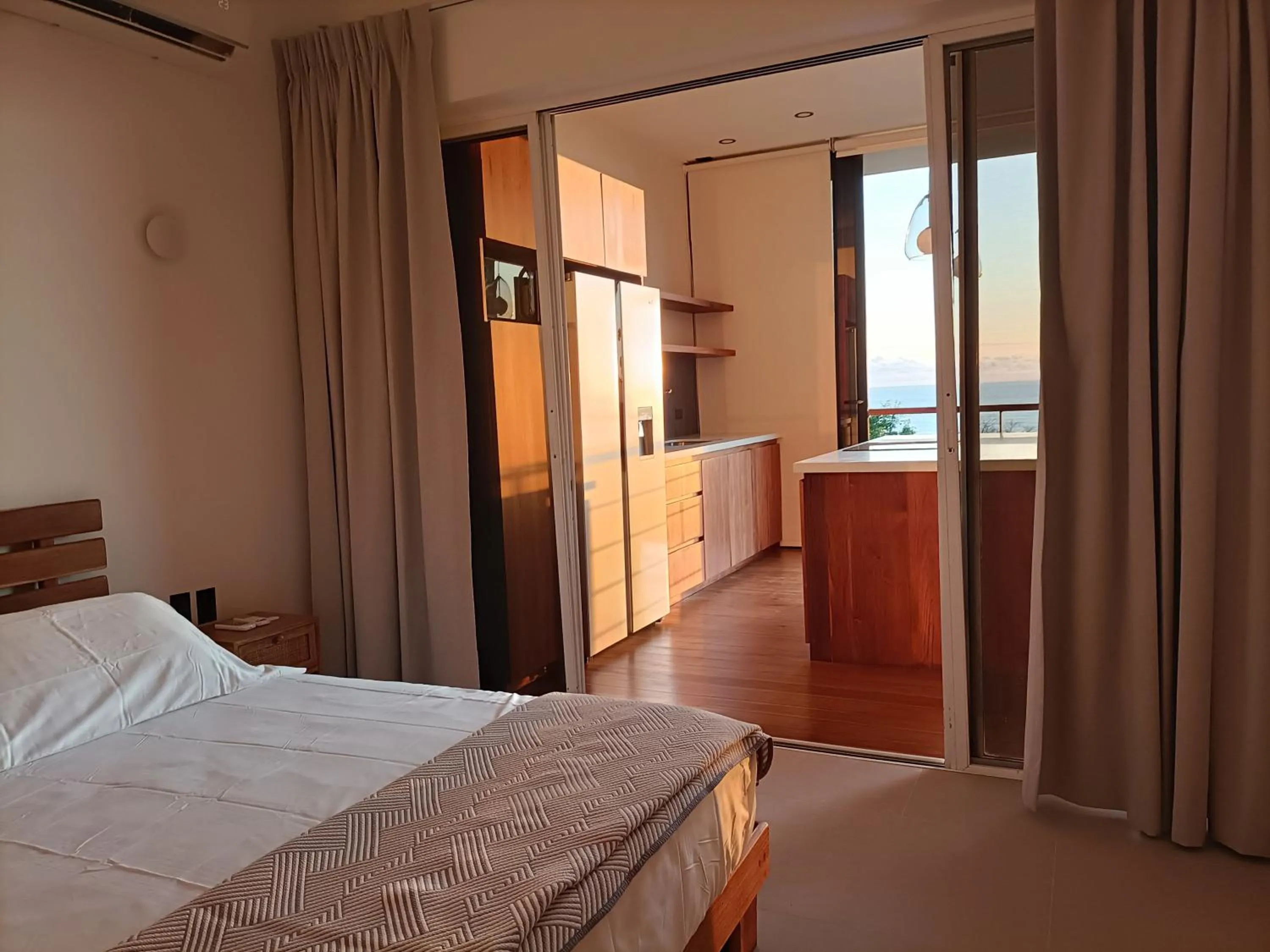 Bed in Vista Naranja Ocean View - Suite Apartment