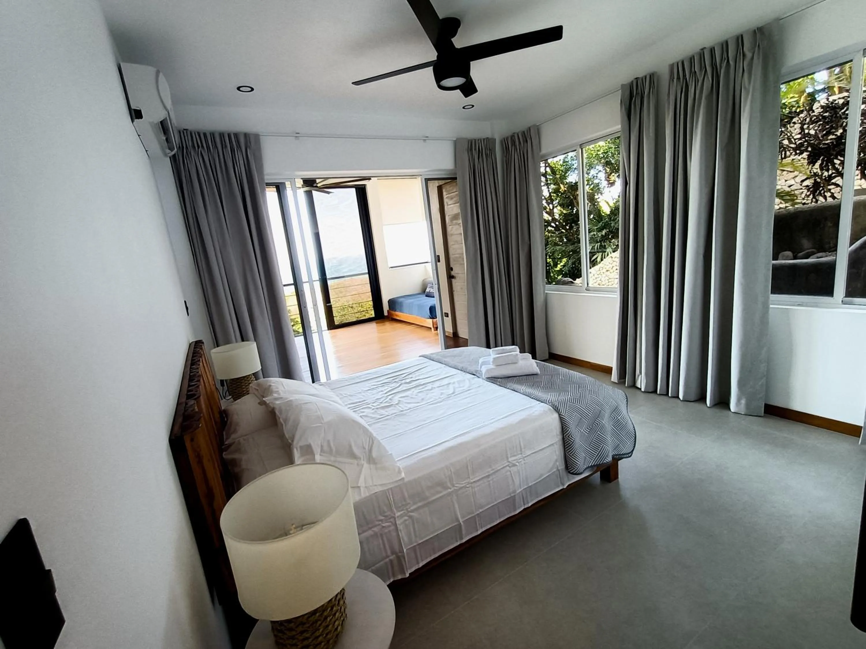 Bed in Vista Naranja Ocean View - Suite Apartment