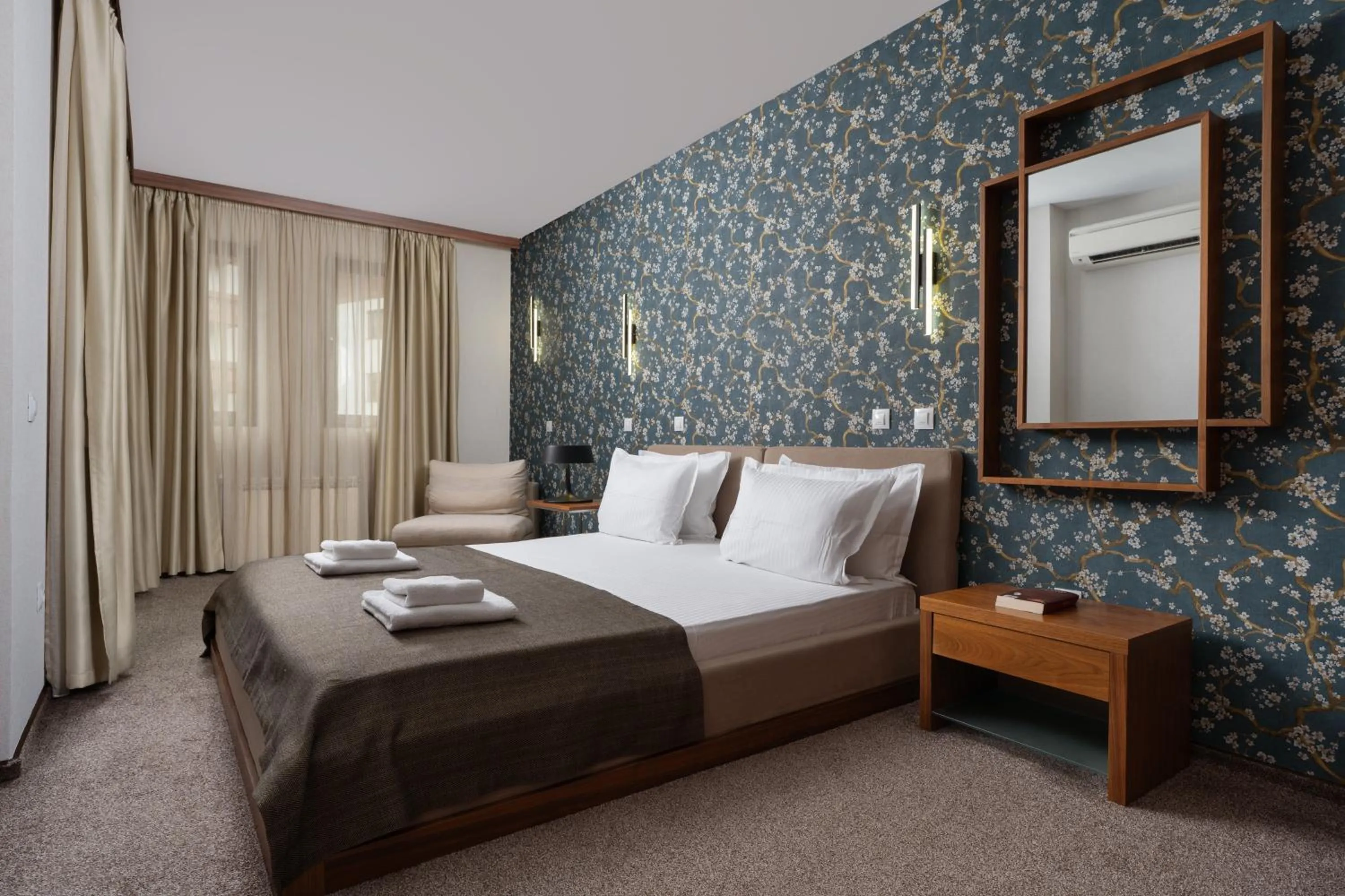 Bed in Boutique Hotel Uniqato