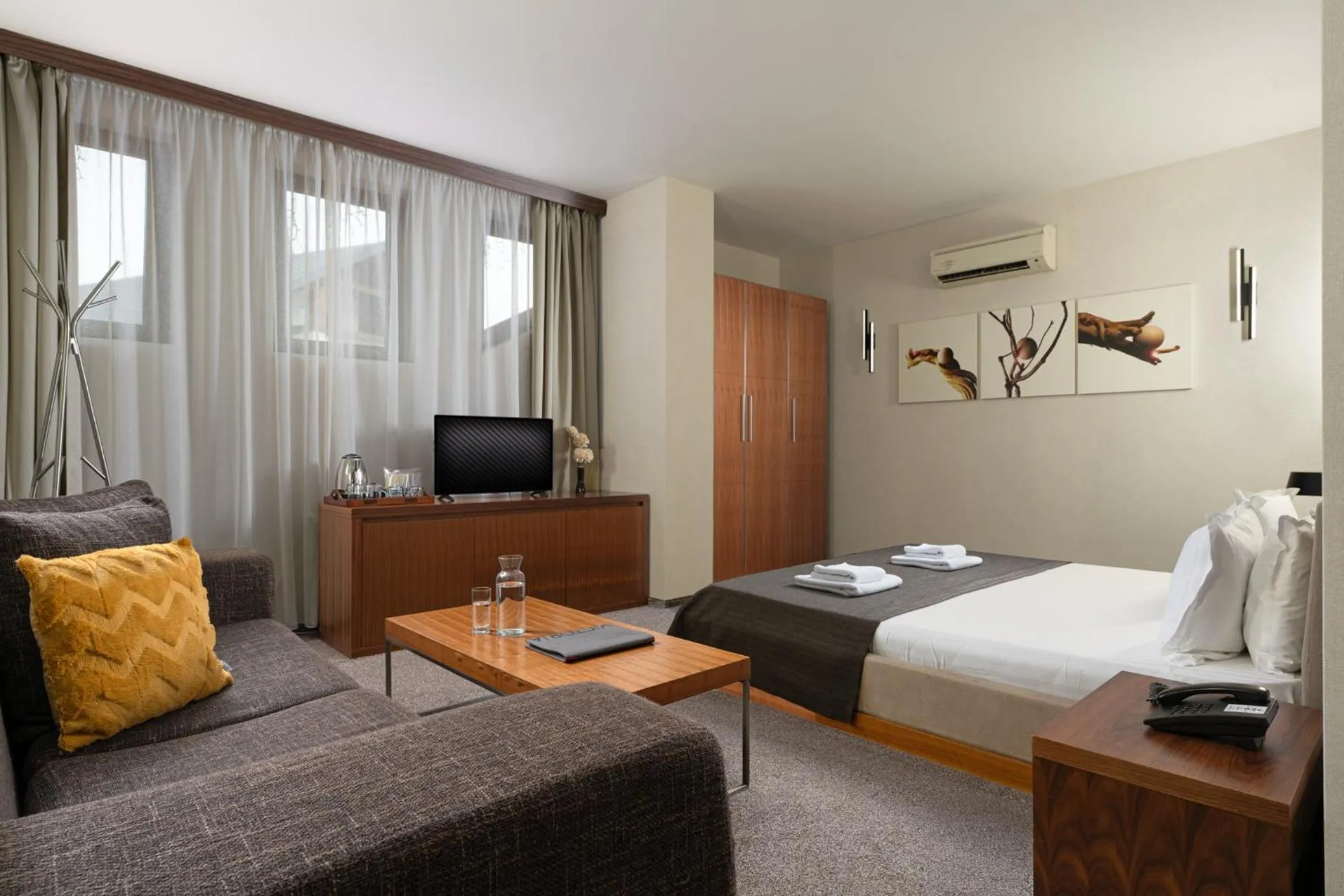 Bed in Boutique Hotel Uniqato