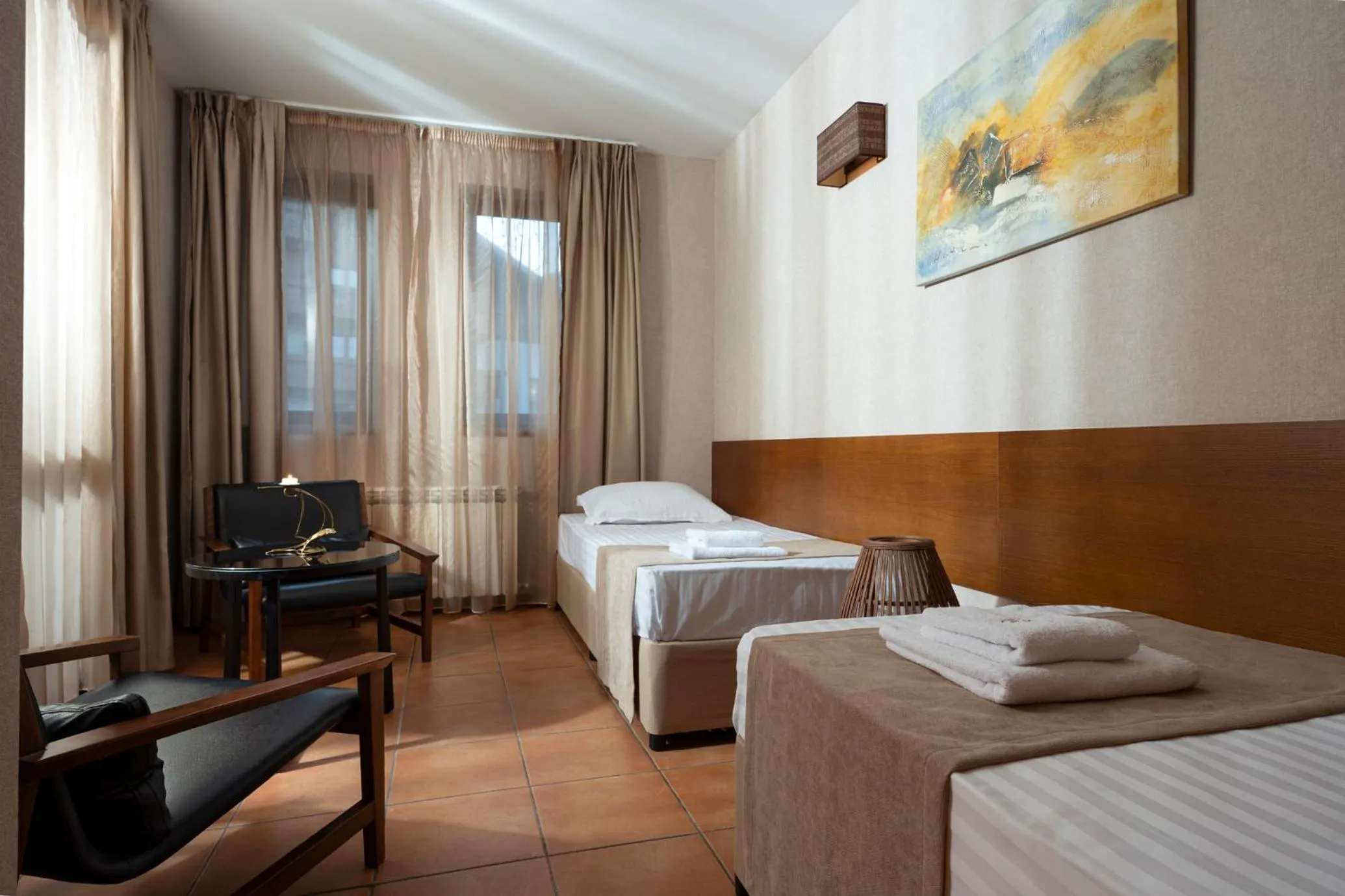 Bed in Boutique Hotel Uniqato