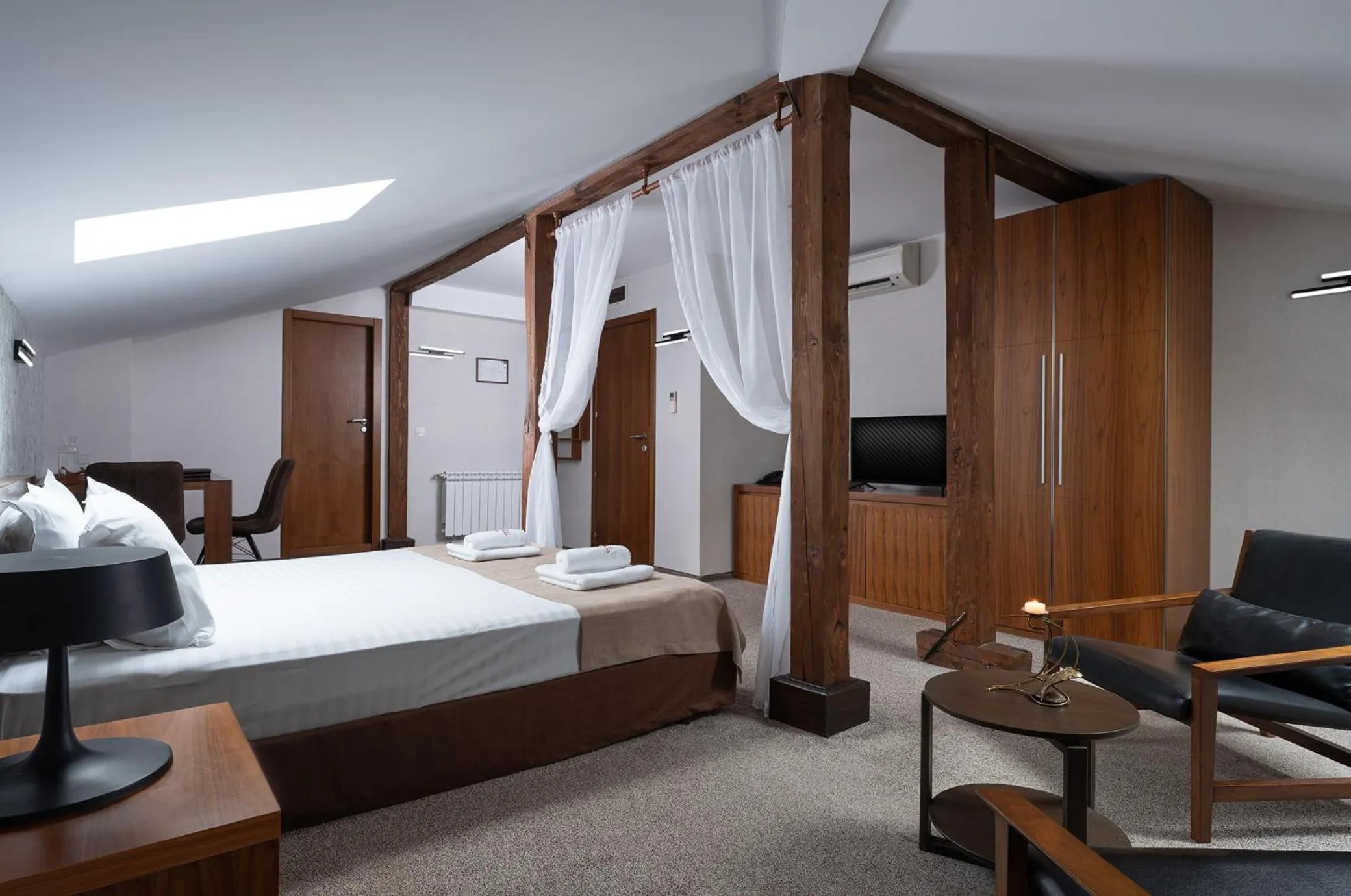 Bed in Boutique Hotel Uniqato