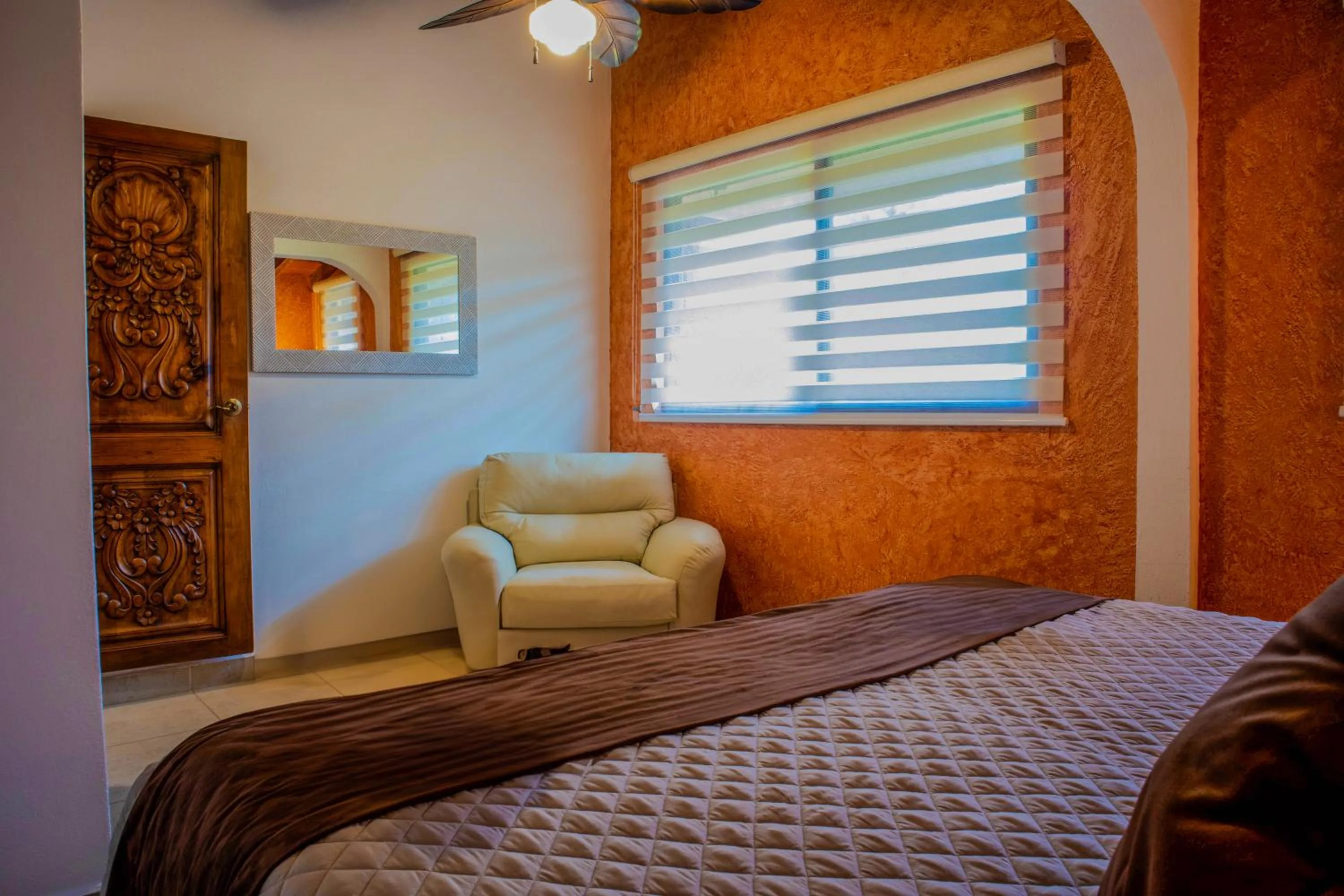 Bed in La Buena Vibra Wellness Resort & Spa