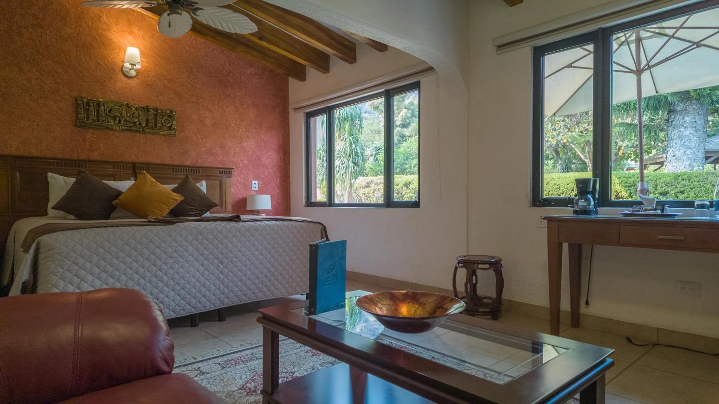 Bed in La Buena Vibra Wellness Resort & Spa