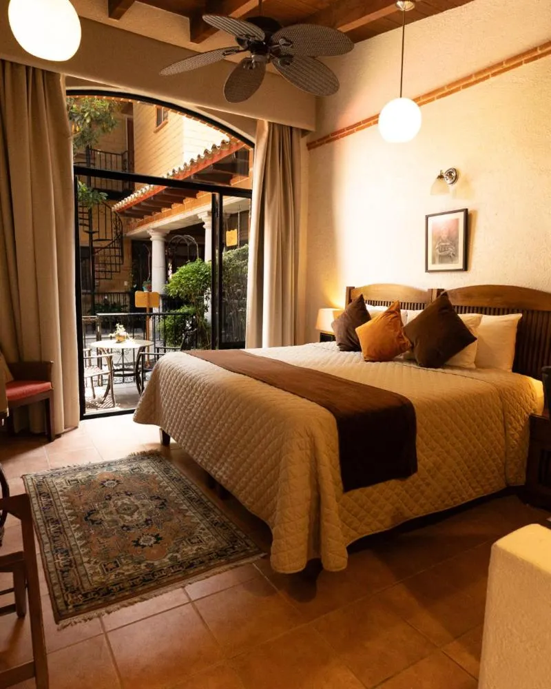 Bed in La Buena Vibra Wellness Resort & Spa