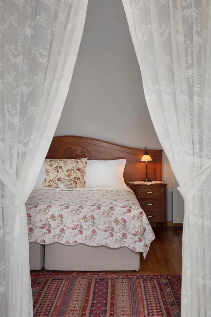 Bed in Casa Lavanda Boutique Hotel