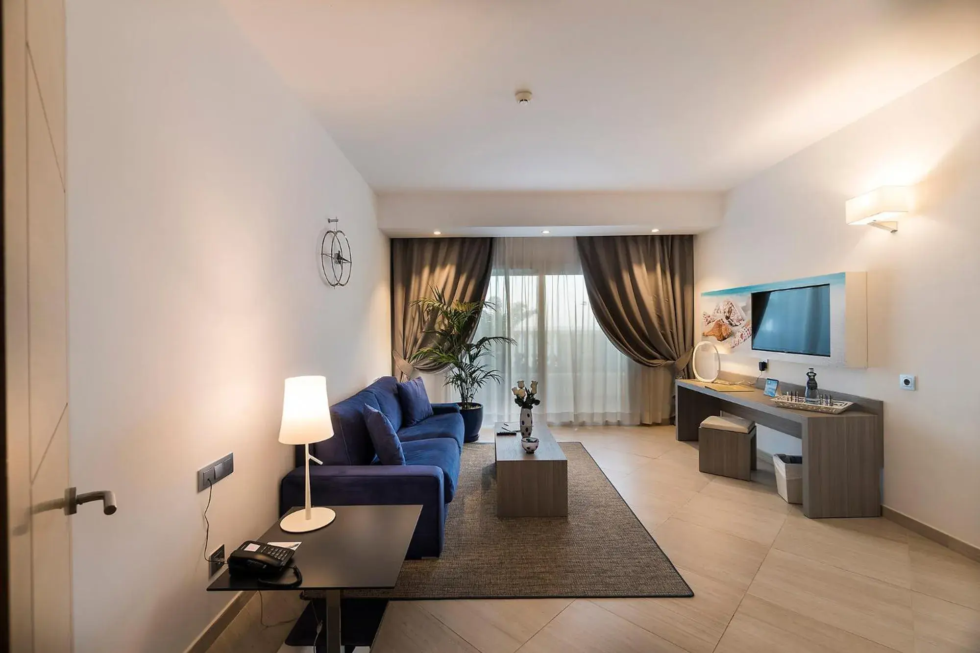 Living room in Royal Palm Resort & Spa - Adults Only Living room in Royal Palm Resort & Spa - Adults Only