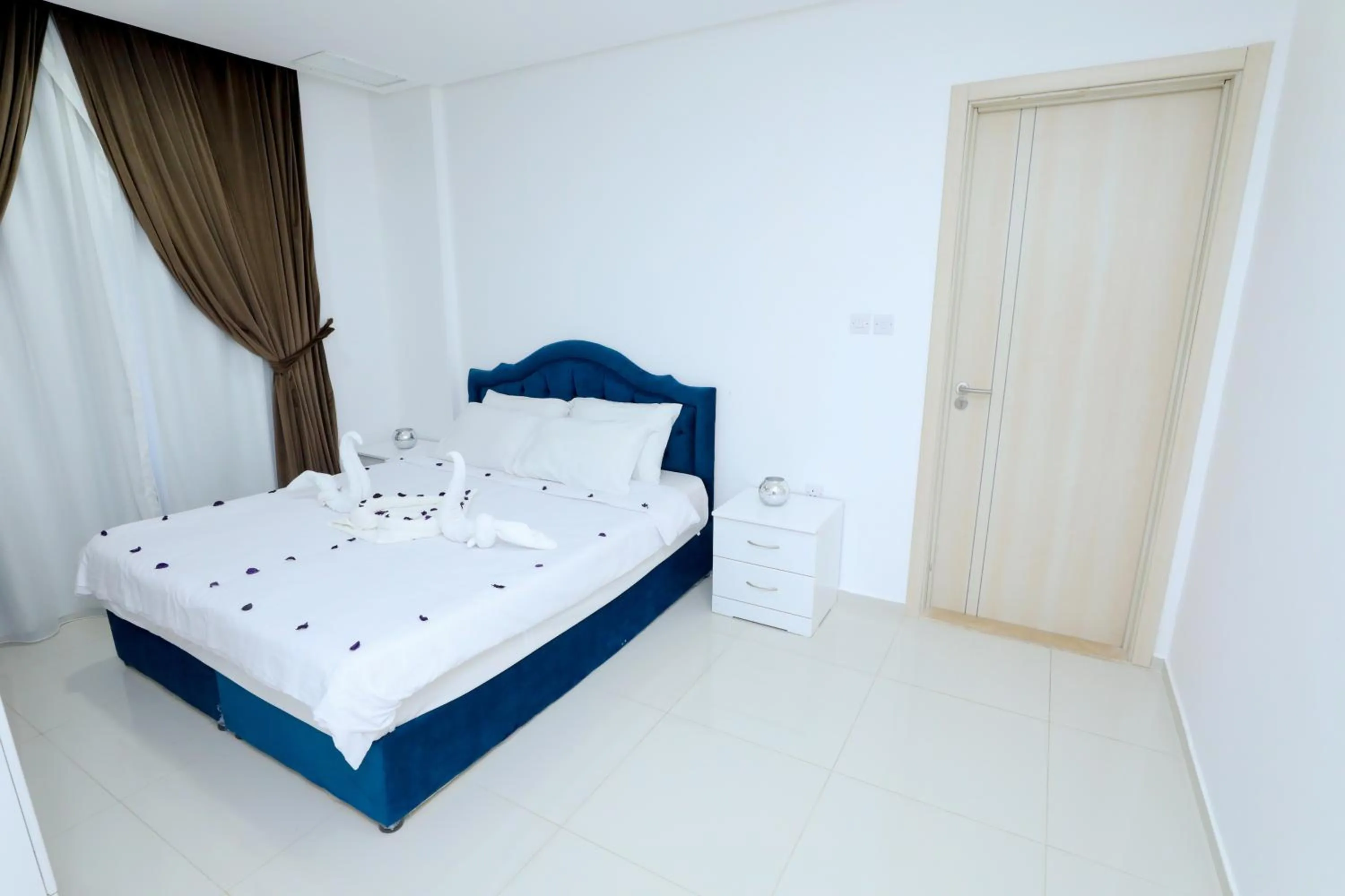 Bed in ماجيك سويت بوليفارد Magic Suite Boulevard