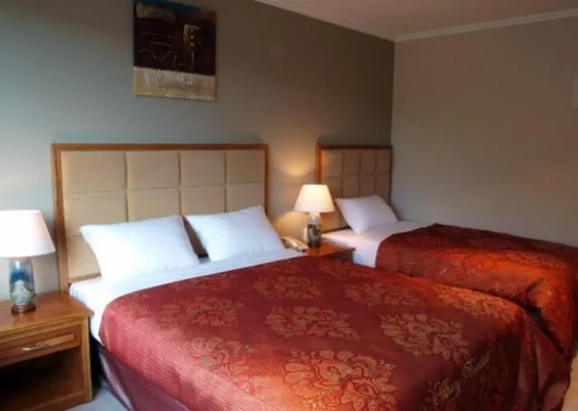 Bed in Albany Rosedale Motel