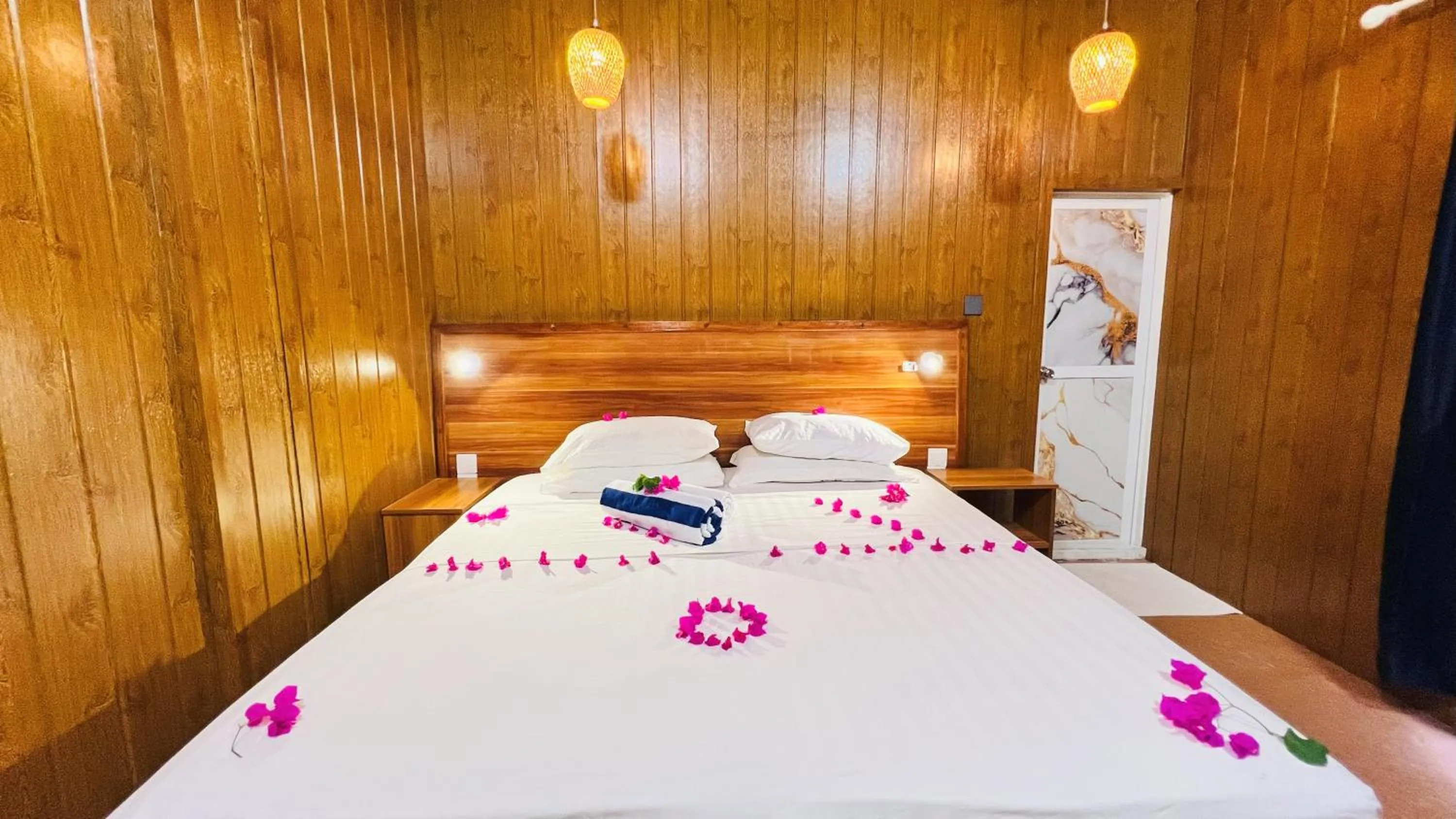 Bed in Batuta Maldives Surf View