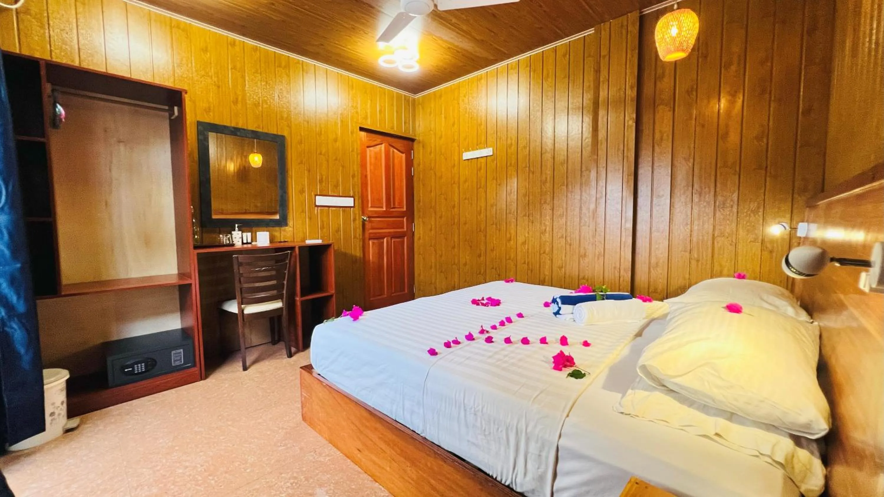 Bed in Batuta Maldives Surf View