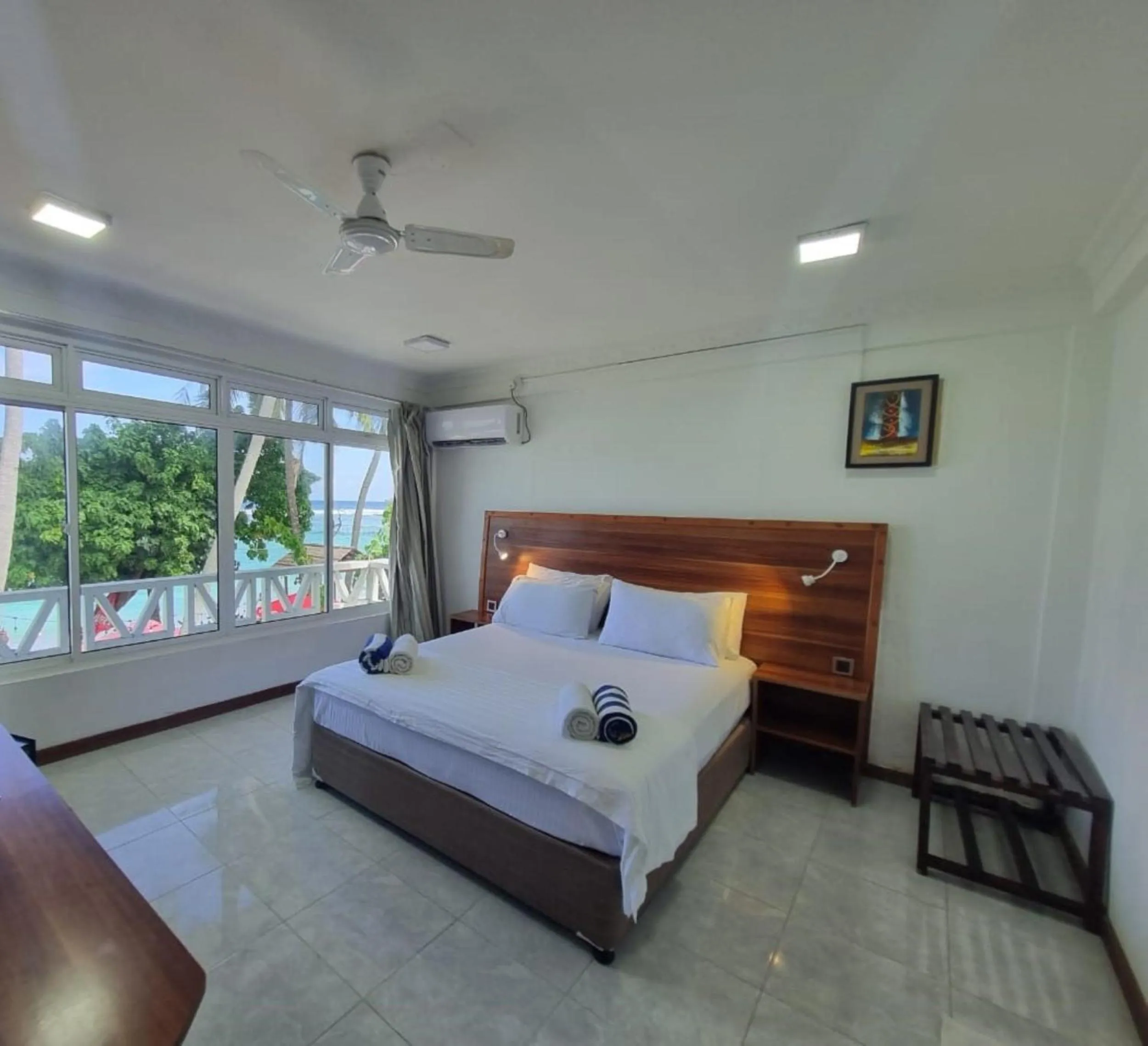 Property building, Bed in Batuta Maldives Surf View
