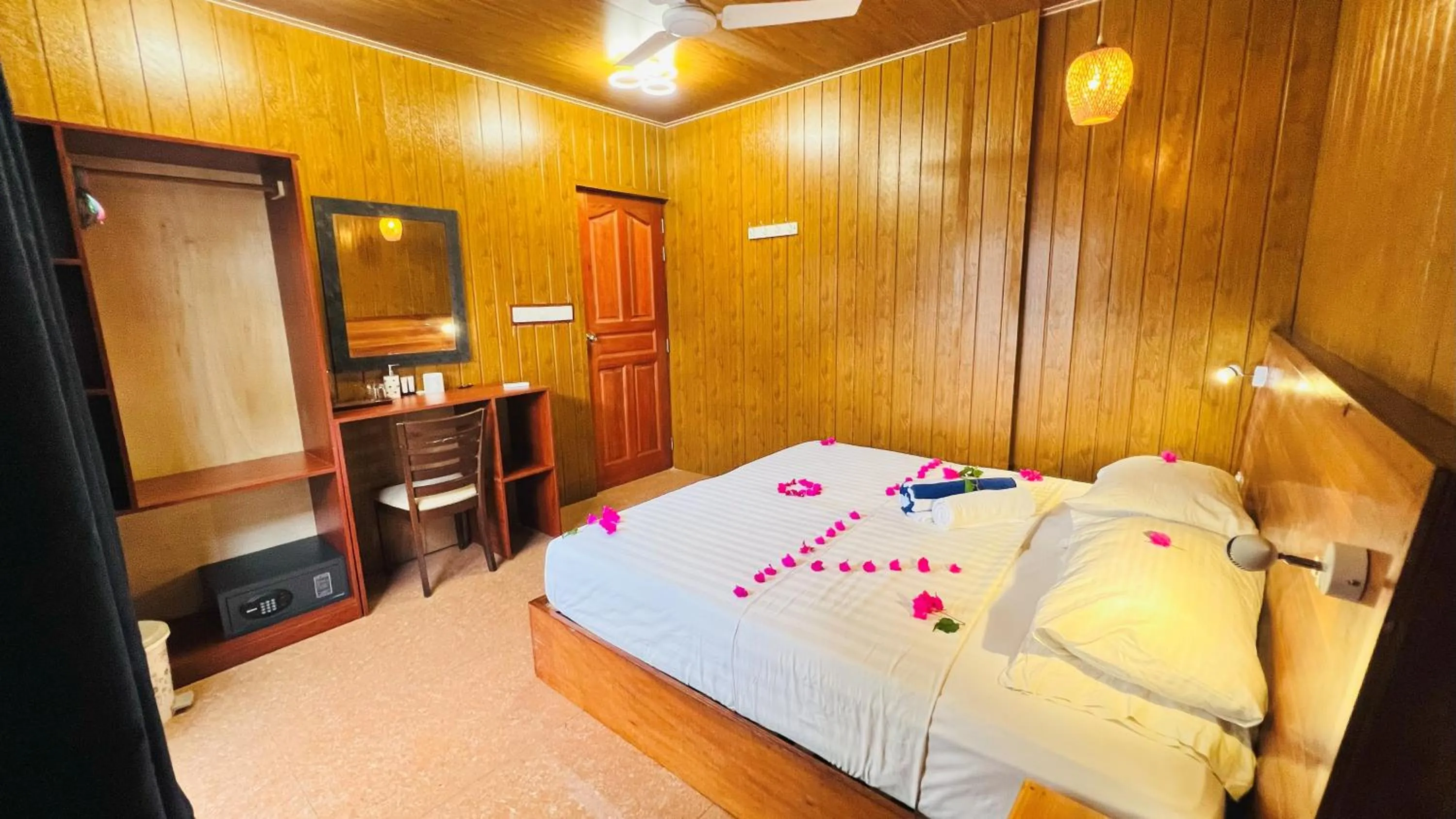 Bed in Batuta Maldives Surf View