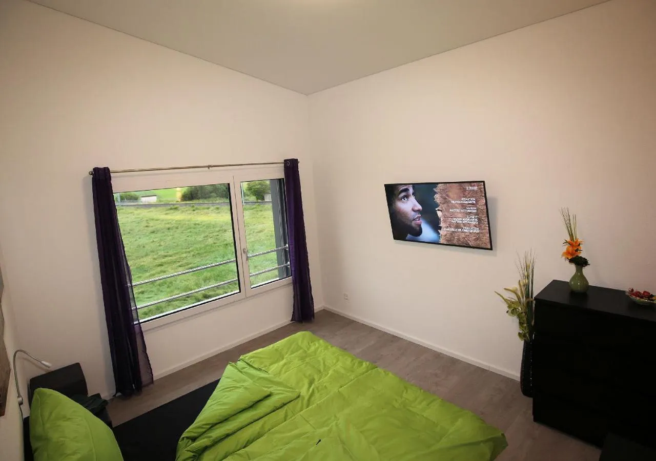 Living room, Bed in BeachIN - Sport, Events, Hotel, Restaurant, Bar