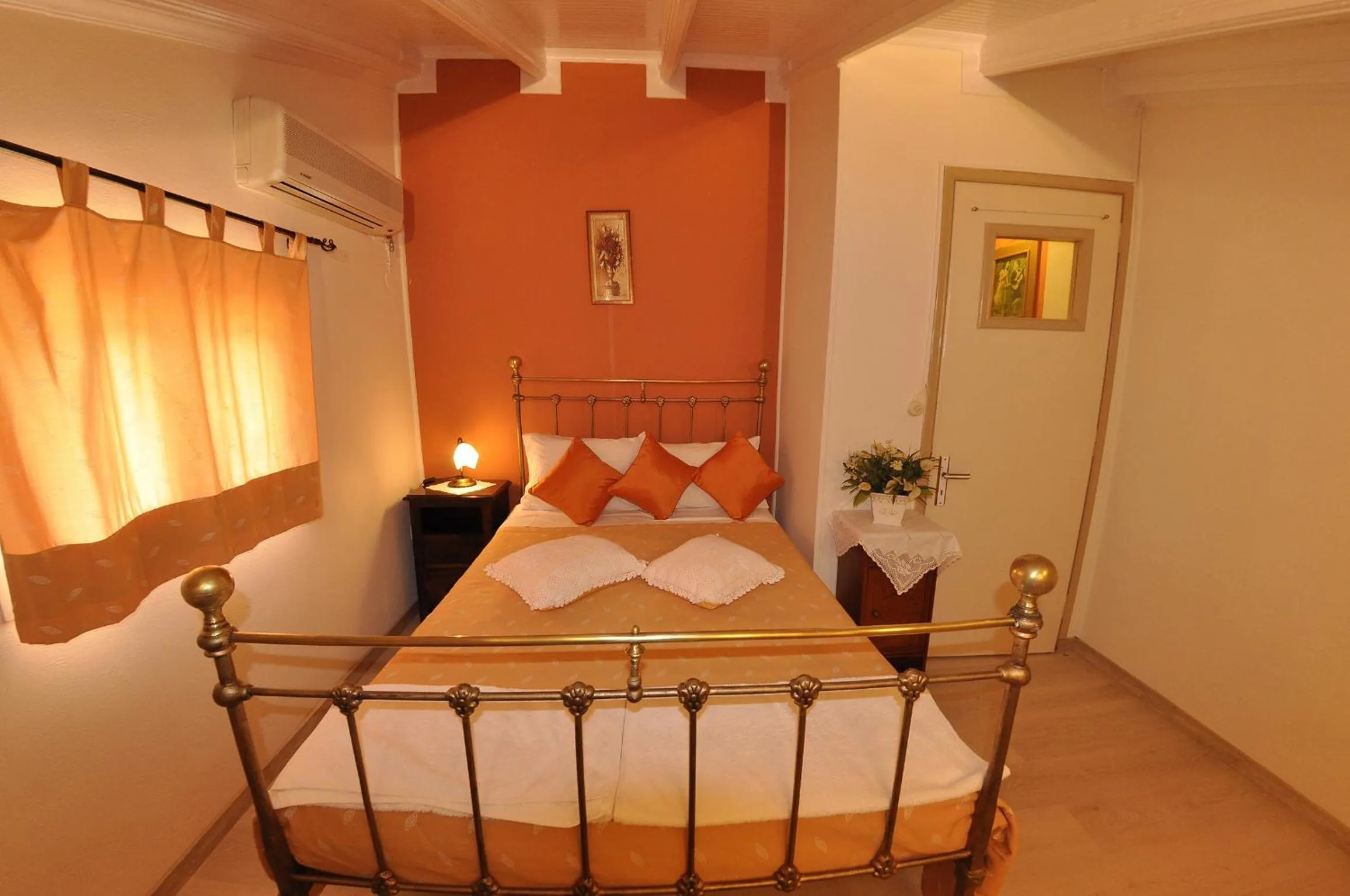 Bed in Mazis Apartments