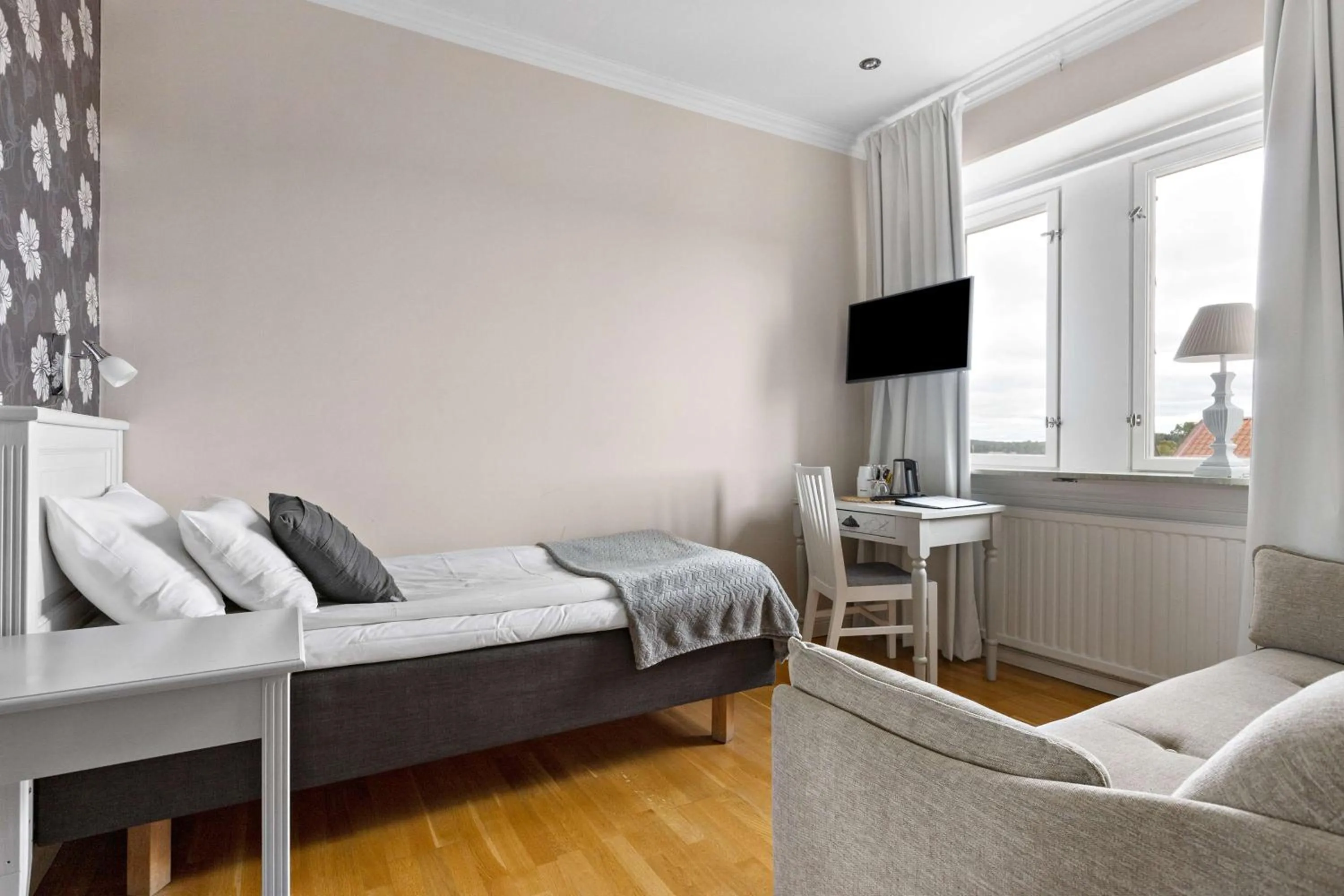 Bedroom, Bed in Nora Stadshotell, Sure Hotel Collection by Best Western