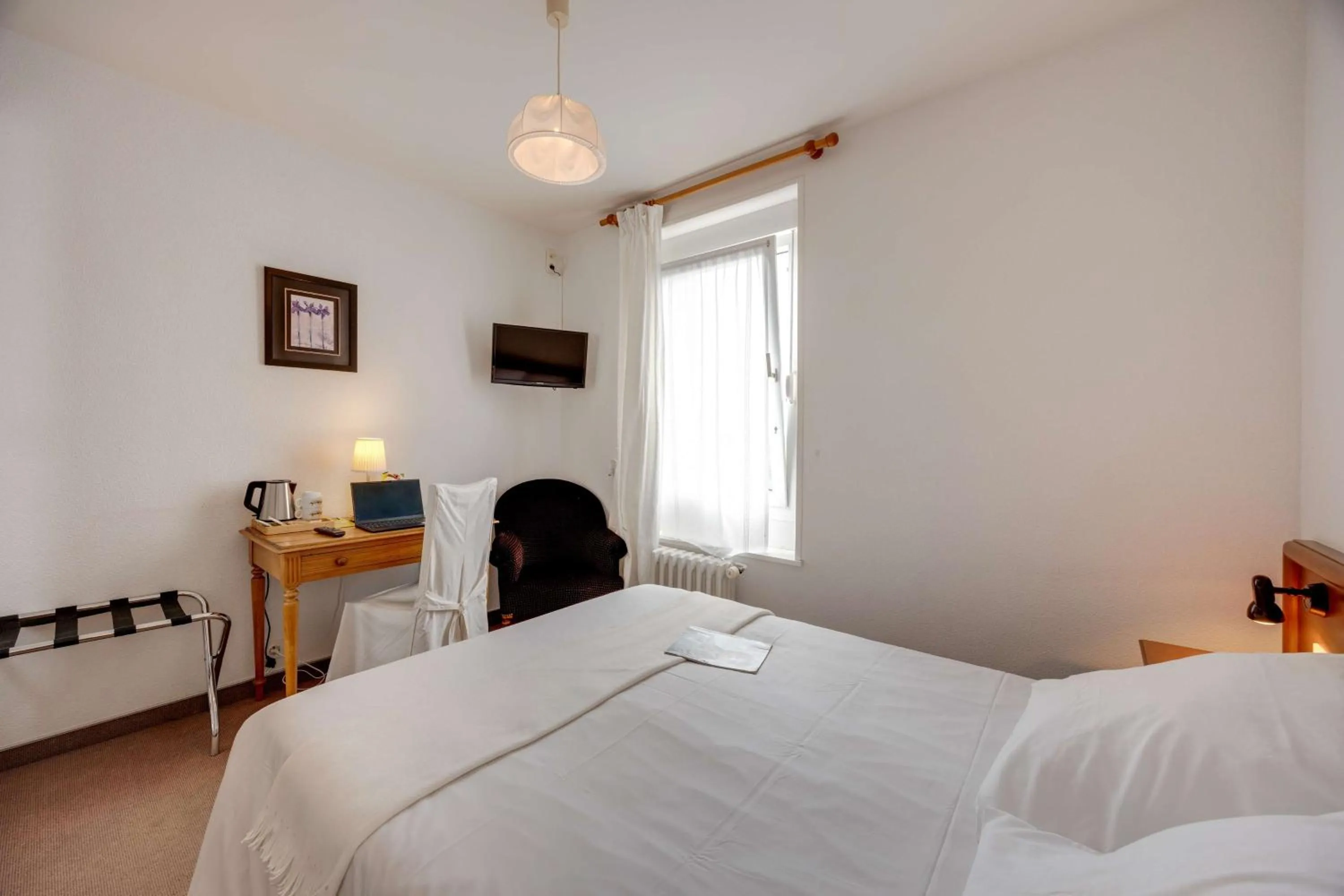 Bedroom, Bed in Brit Hotel Confort Bagnoles Normandie