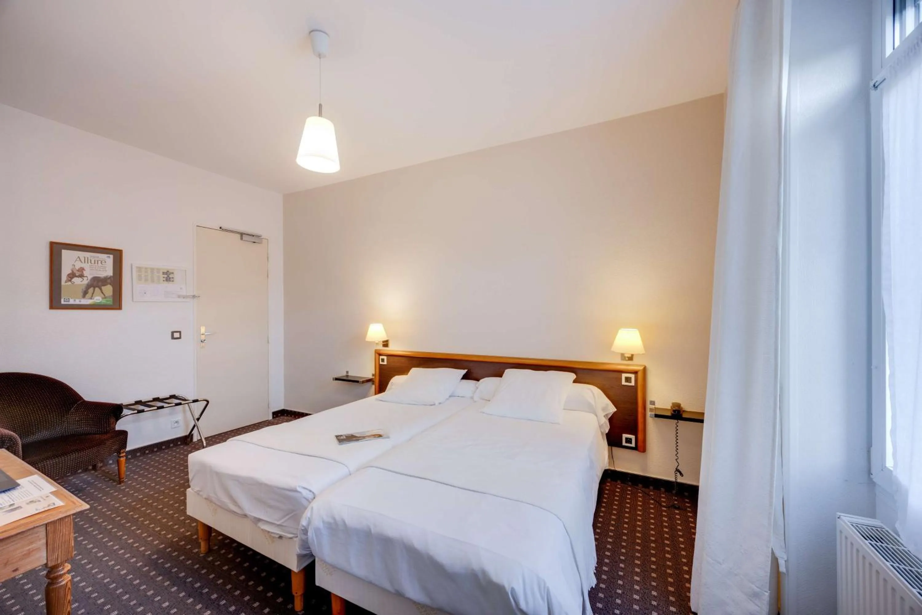 Bedroom, Bed in Brit Hotel Confort Bagnoles Normandie