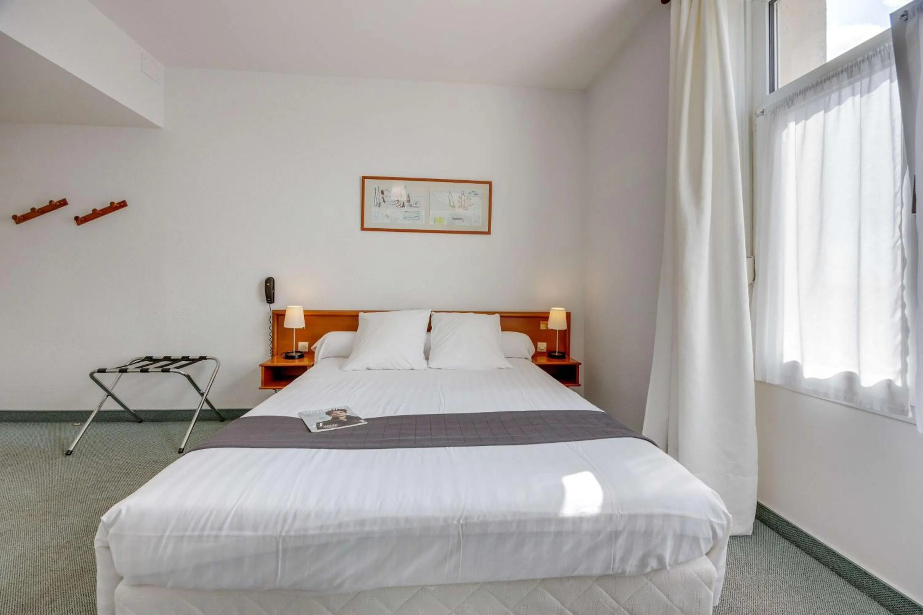 Bedroom, Bed in Brit Hotel Confort Bagnoles Normandie