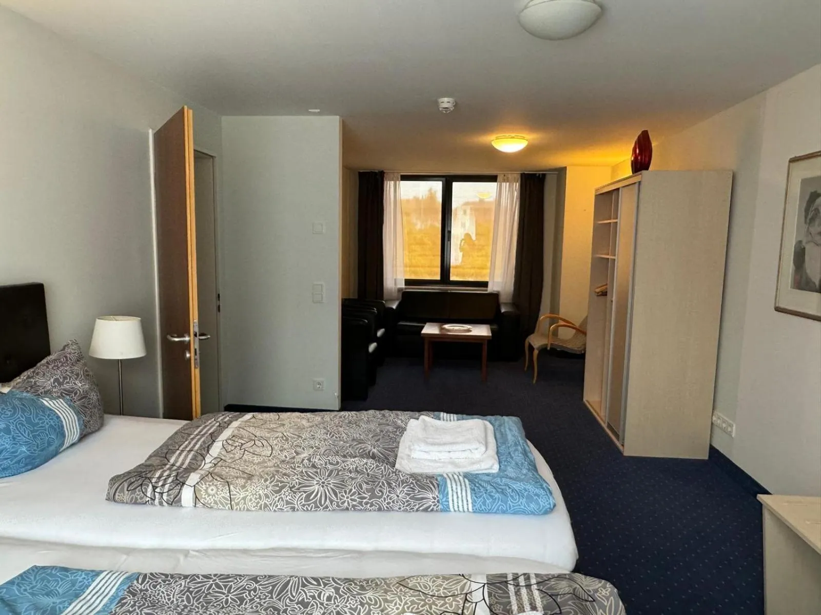 Living room, Bed in Hotel Regina