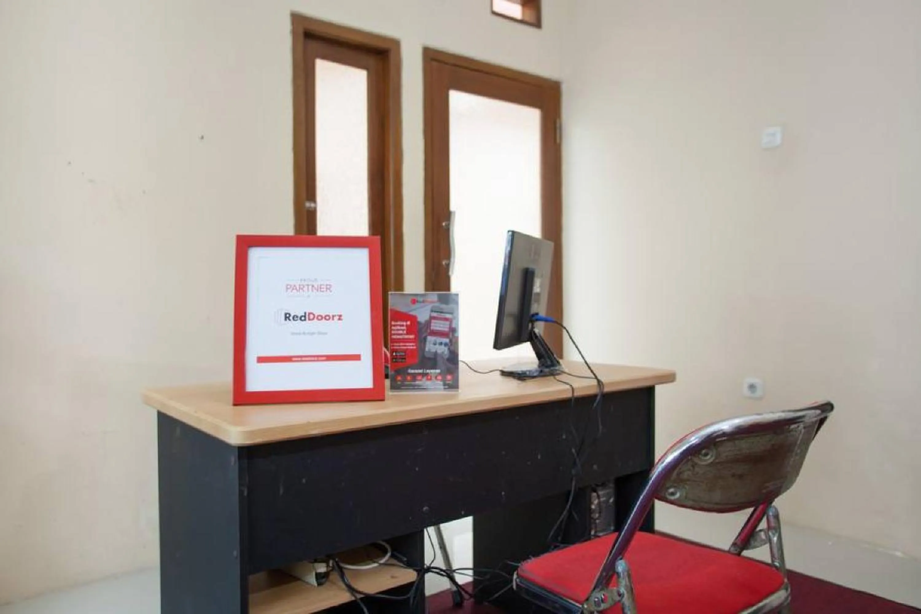 Property logo or sign in RedDoorz Syariah near UNTAG Banyuwangi