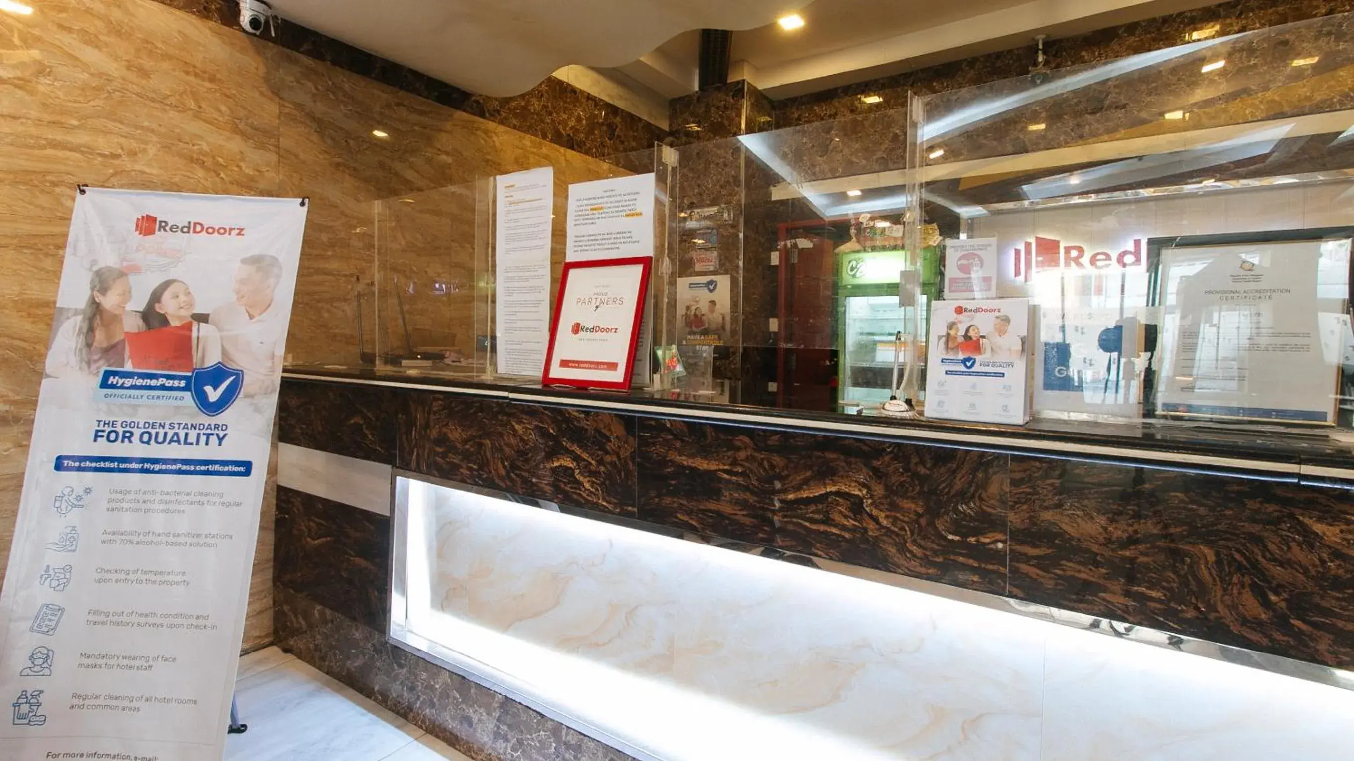 Lobby or reception in RedDoorz Plus at Winter Benitez Lobby or reception in RedDoorz Plus at Winter Benitez