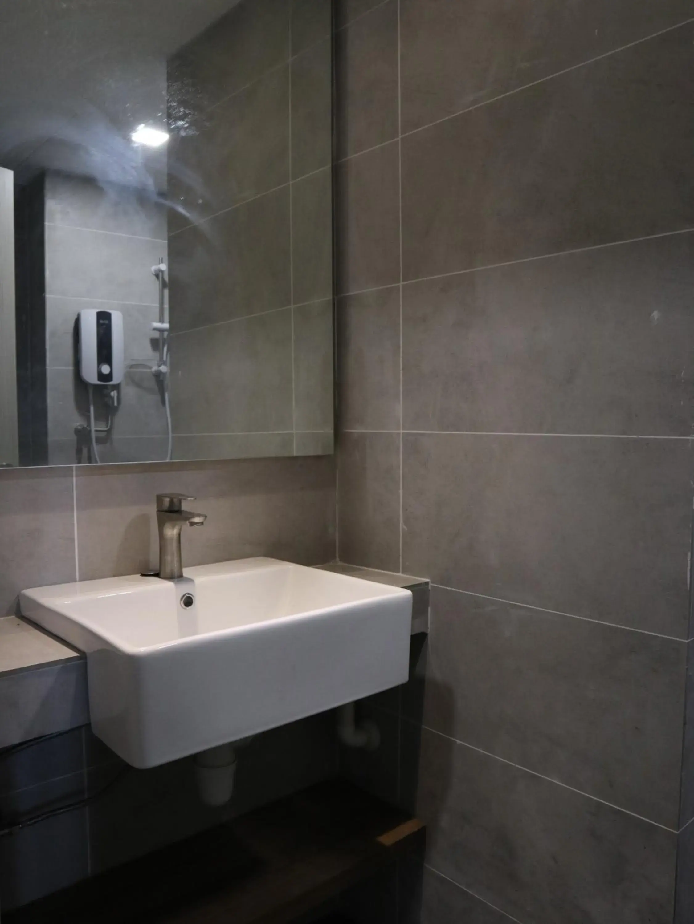 Bathroom in Roxy Sematan Villa & Townhouse Bathroom in Roxy Sematan Villa & Townhouse