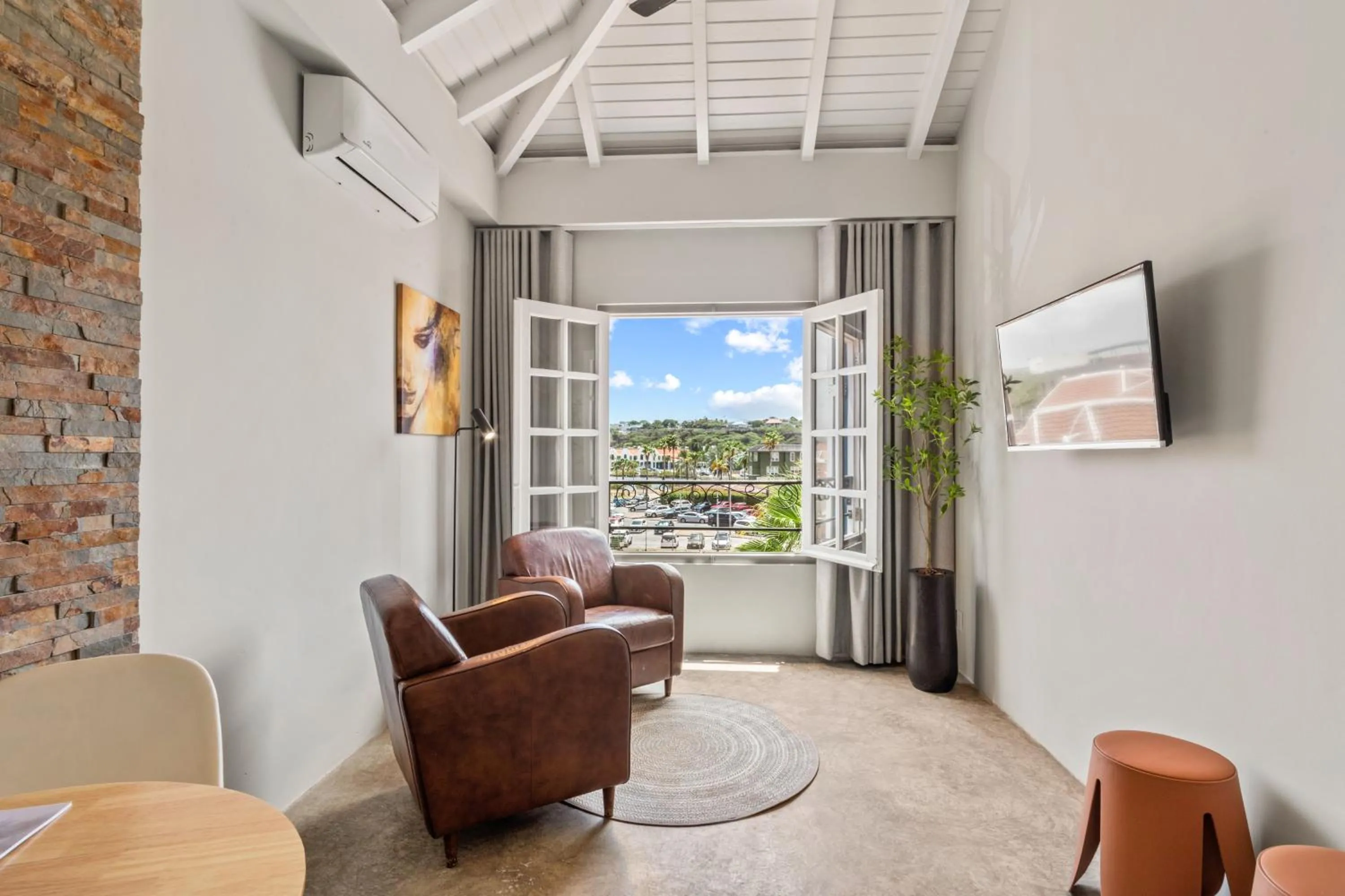 Communal lounge/ TV room in PM78 Boutique Apartments