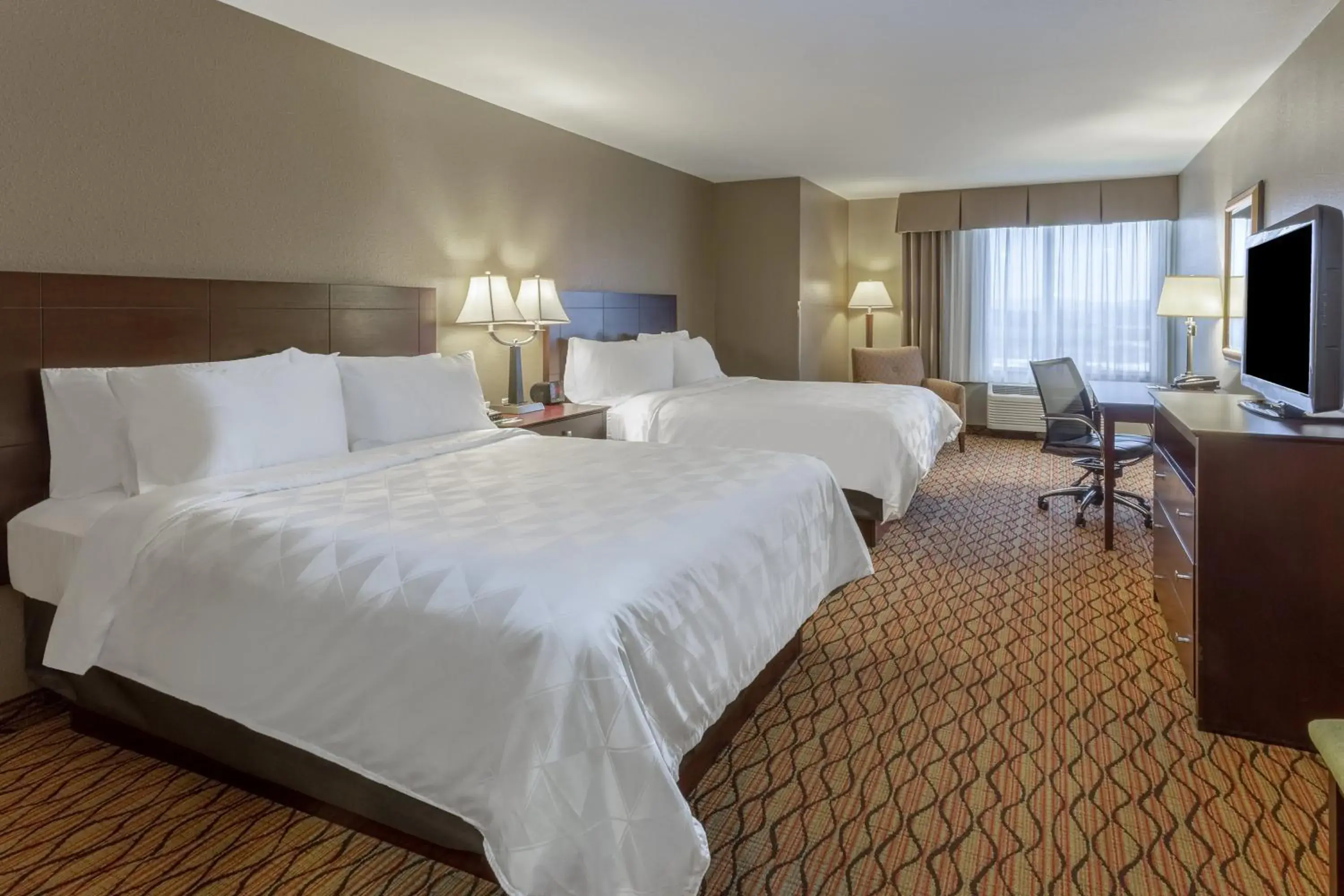 Executive Queen Room with Two Queen Beds in Holiday Inn Eau Claire South I-94 by IHG Executive Queen Room with Two Queen Beds in Holiday Inn Eau Claire South I-94 by IHG