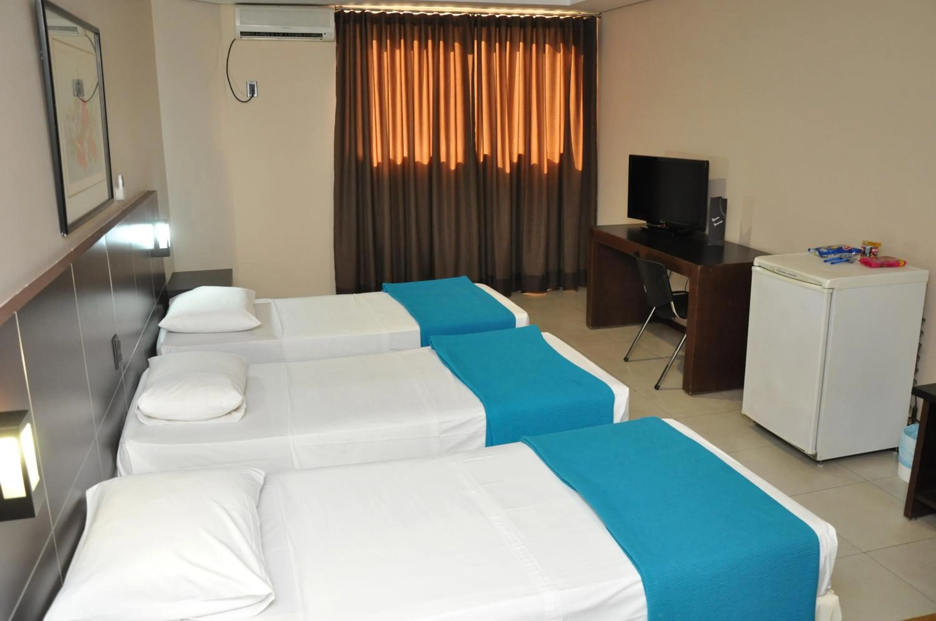 Bed in Crystal Plaza Hotel