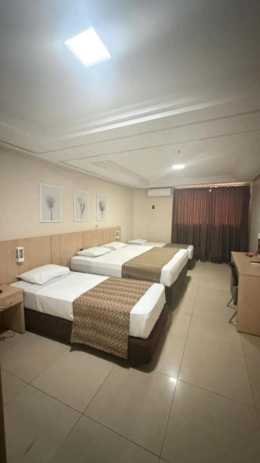 Bed in Crystal Plaza Hotel