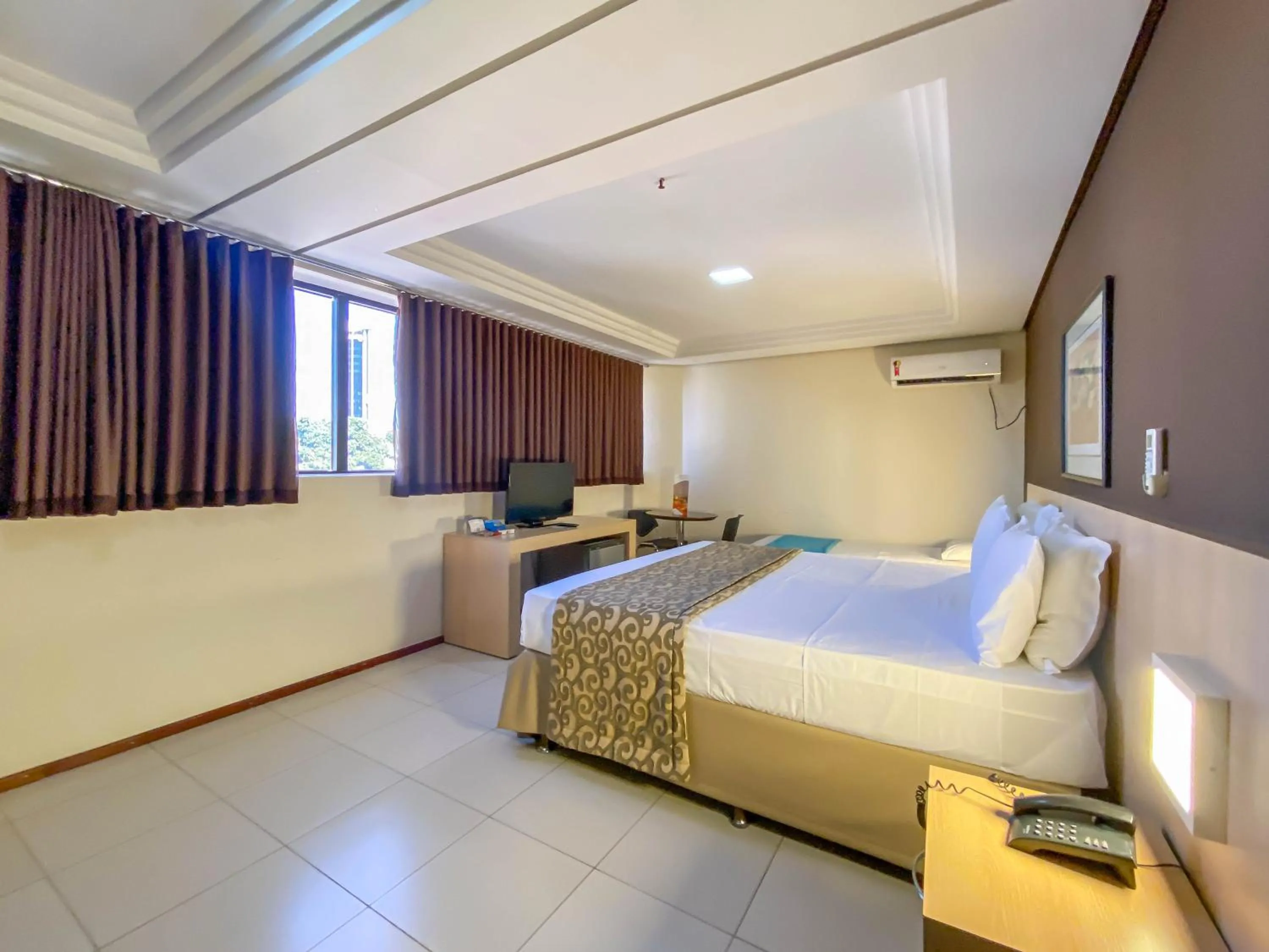 Bed in Crystal Plaza Hotel