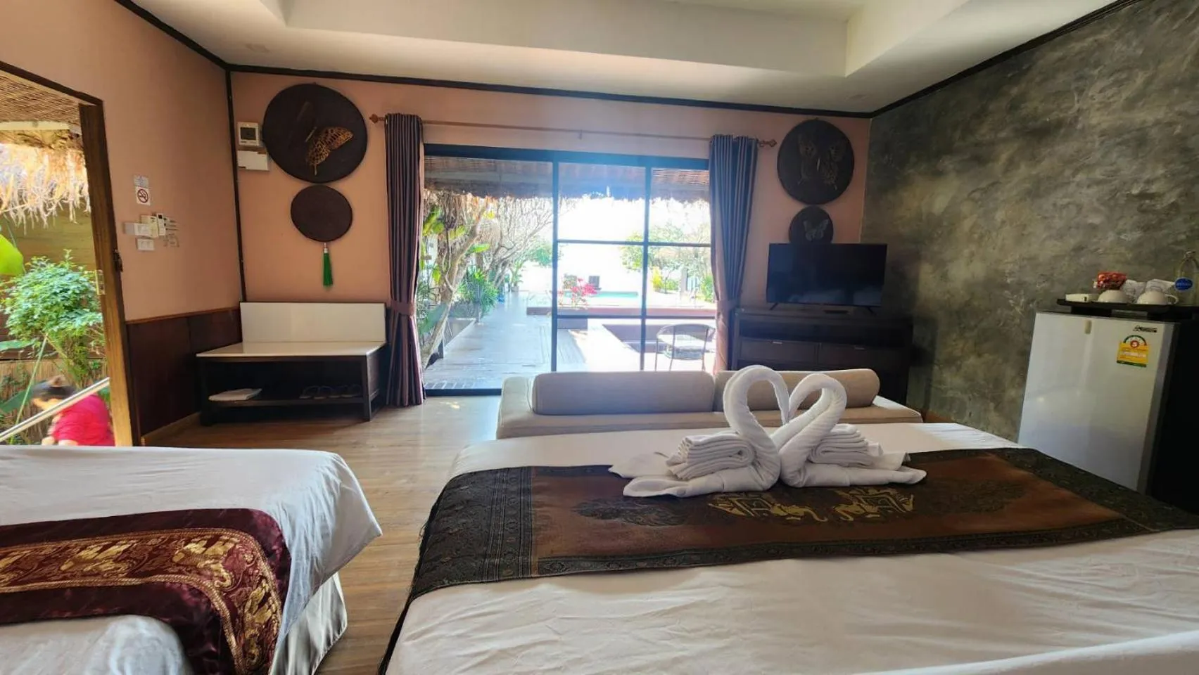Bed in Naga Tara Boutique Resort