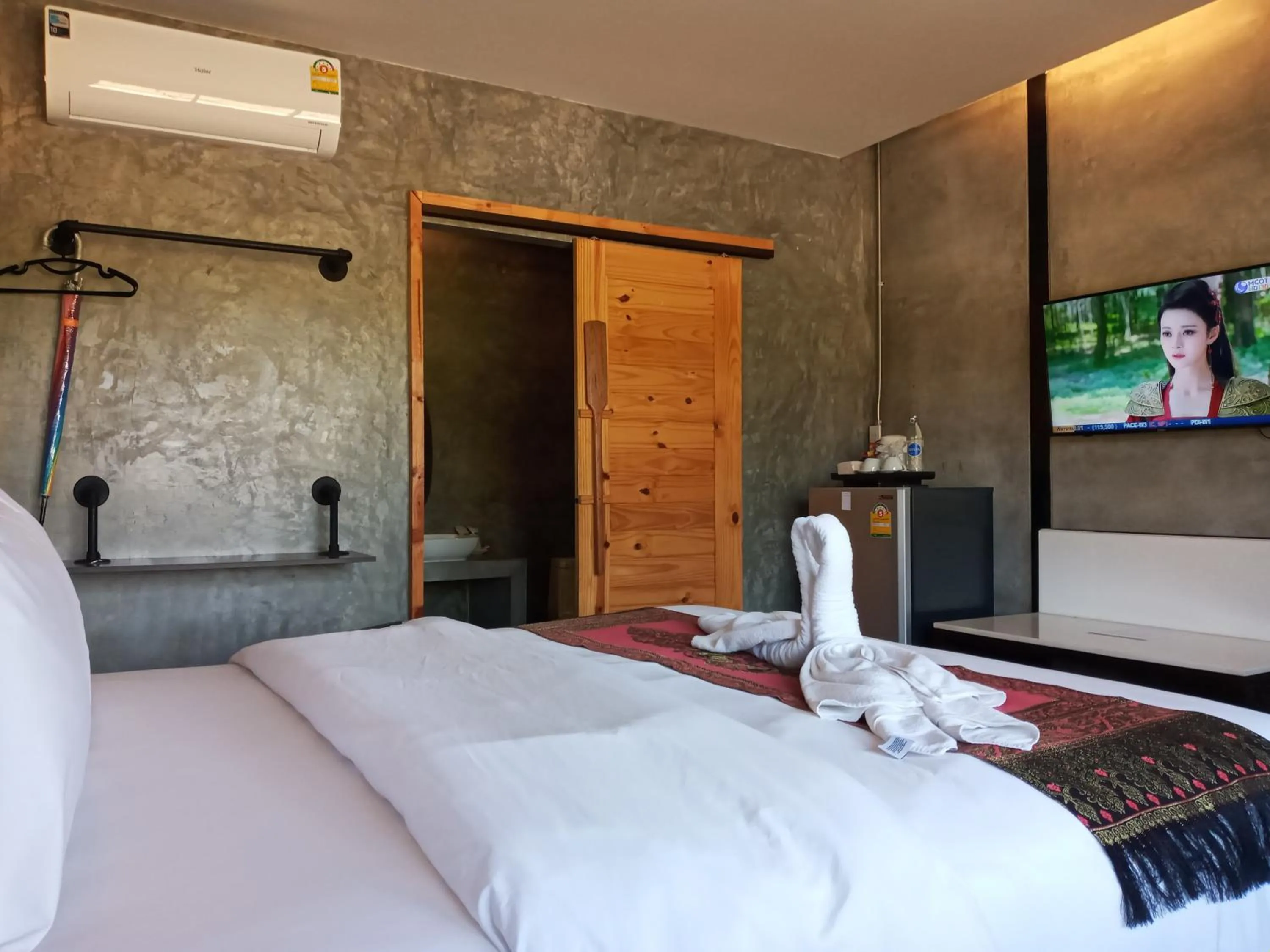 Bed in Naga Tara Boutique Resort